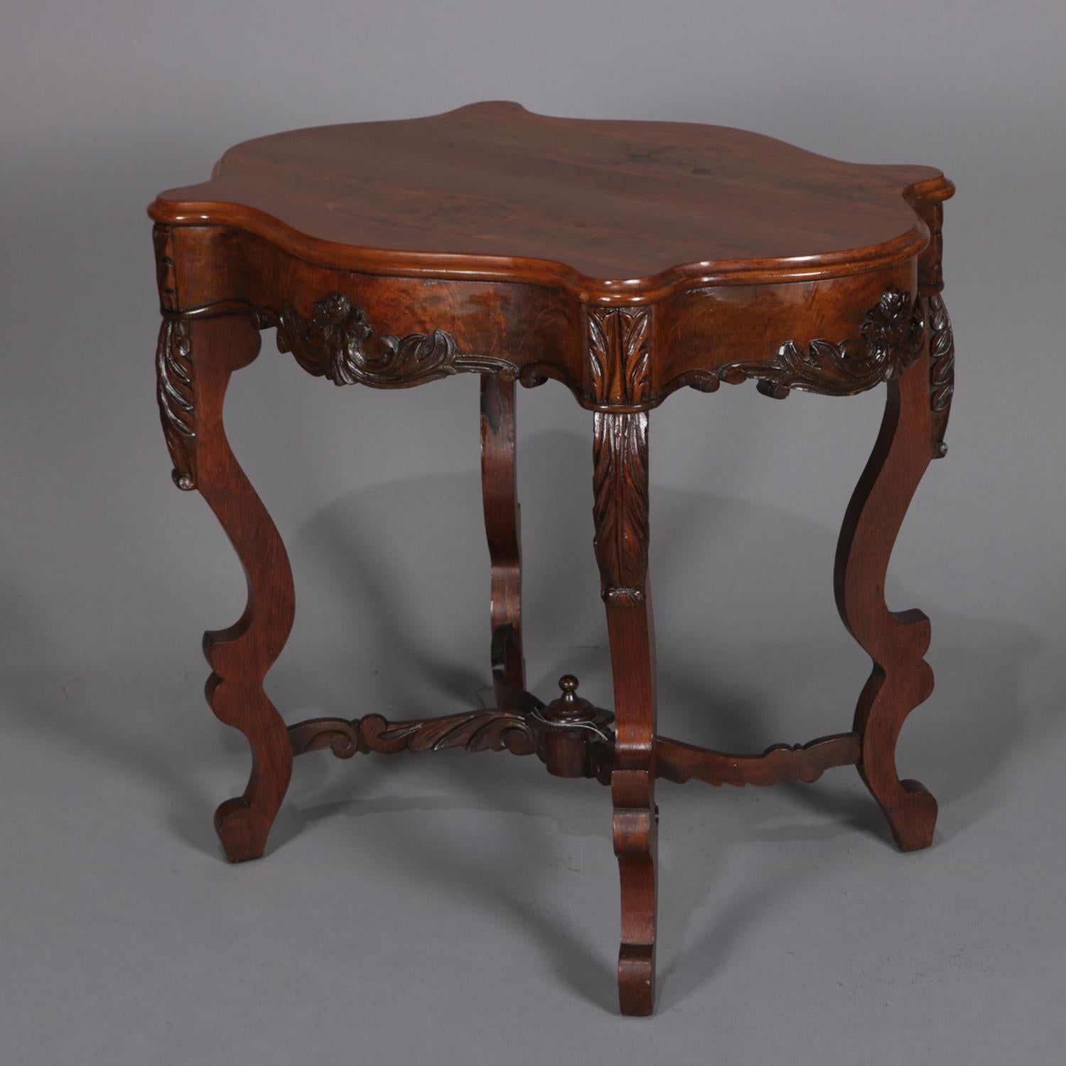 American Antique Foliate and Floral Carved Walnut Center Table, circa 1890