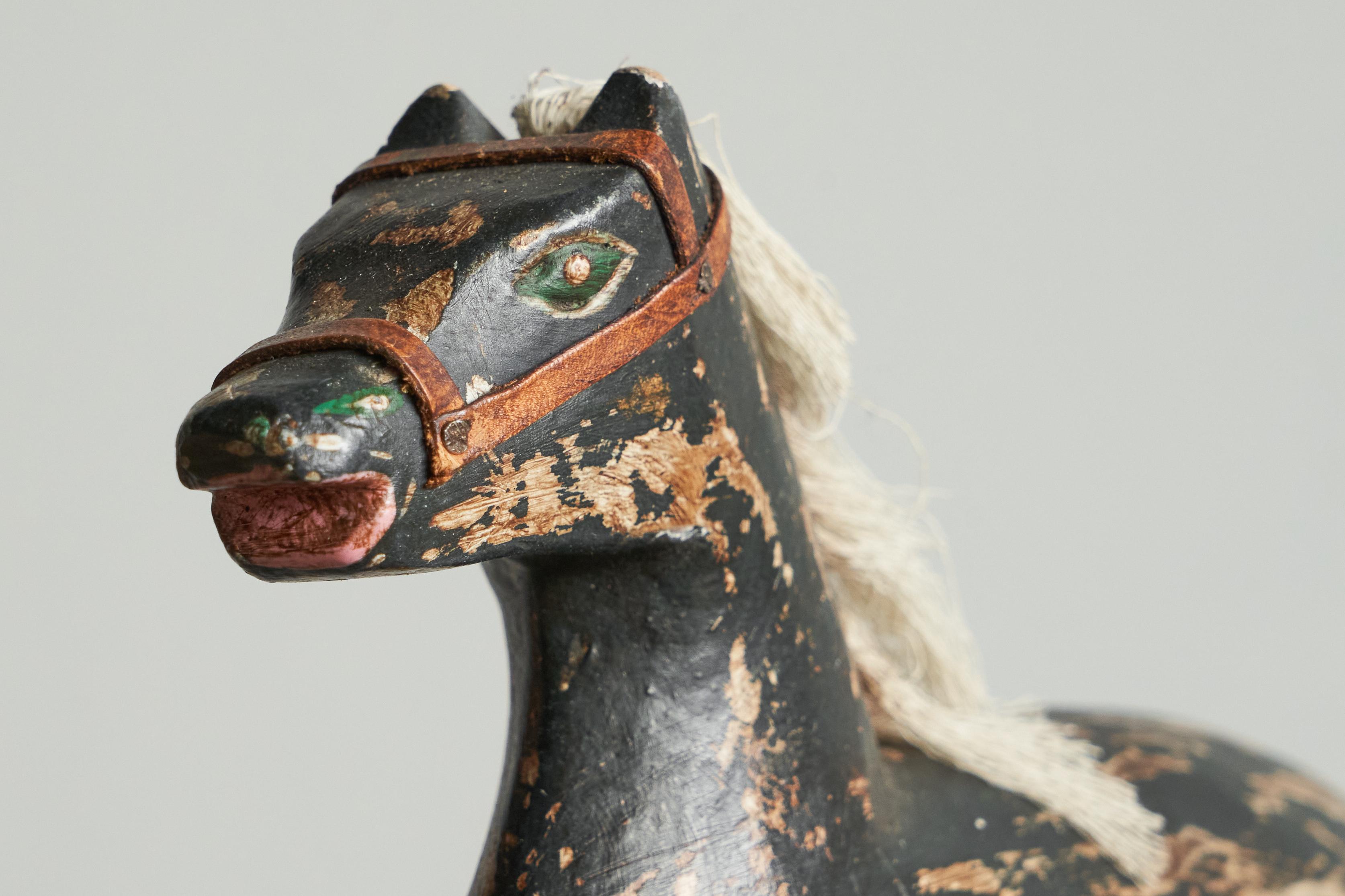 European Antique Folk Art Miniature Rocking Horse in Painted Wood For Sale