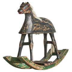 Caballo balancín en miniatura de madera pintada, arte popular antiguo