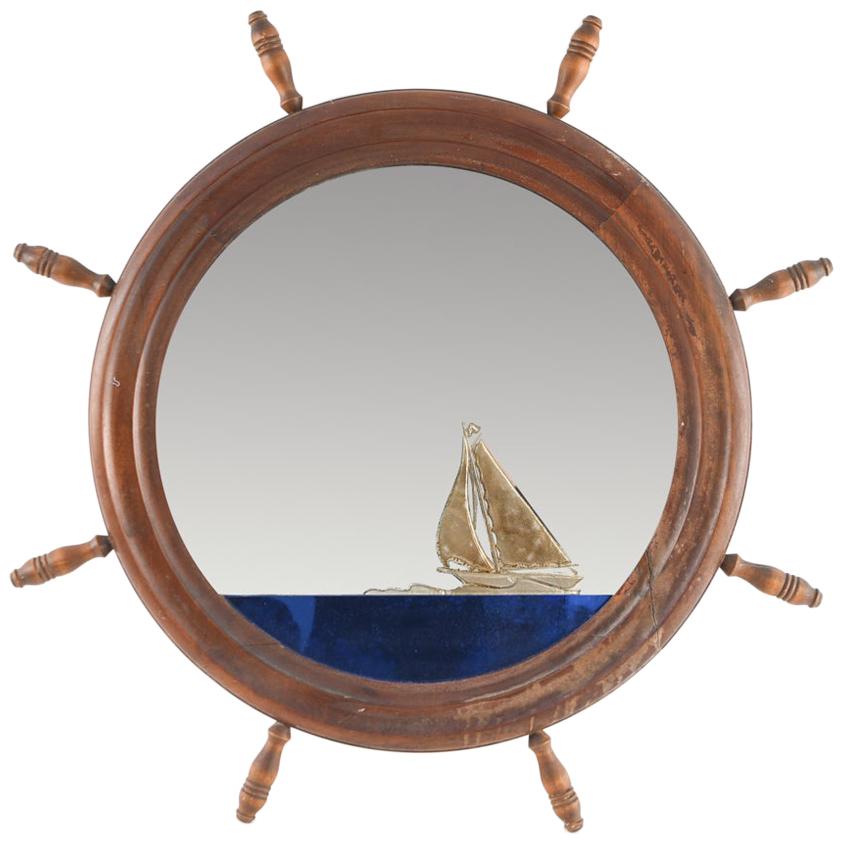 Antique Folk Art Reverse-Gilded Verre Églomisé Mirror with Ship's Helm Frame