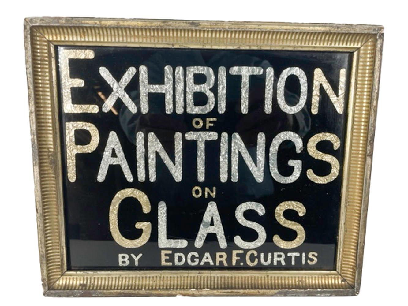 Folk Art exhibition sign, reverse painted glass with reserved text backed in gold and silver crinkled foil reading 