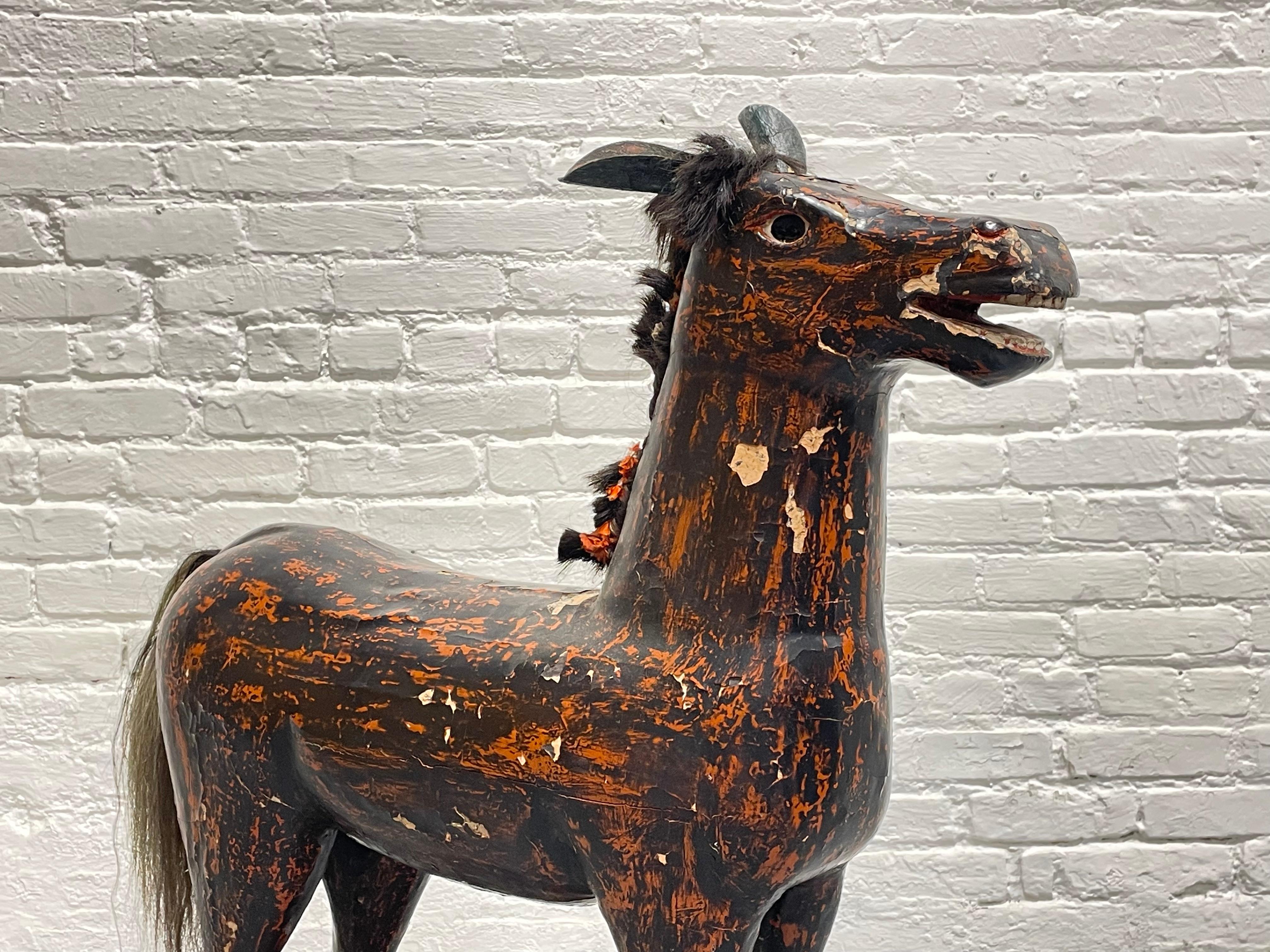 Hand-Carved ANTIQUE Folk Art Ride On HORSE On Wheels, c. 1910 For Sale