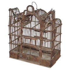 Cage à oiseaux d'art populaire antique en bois et fil de fer