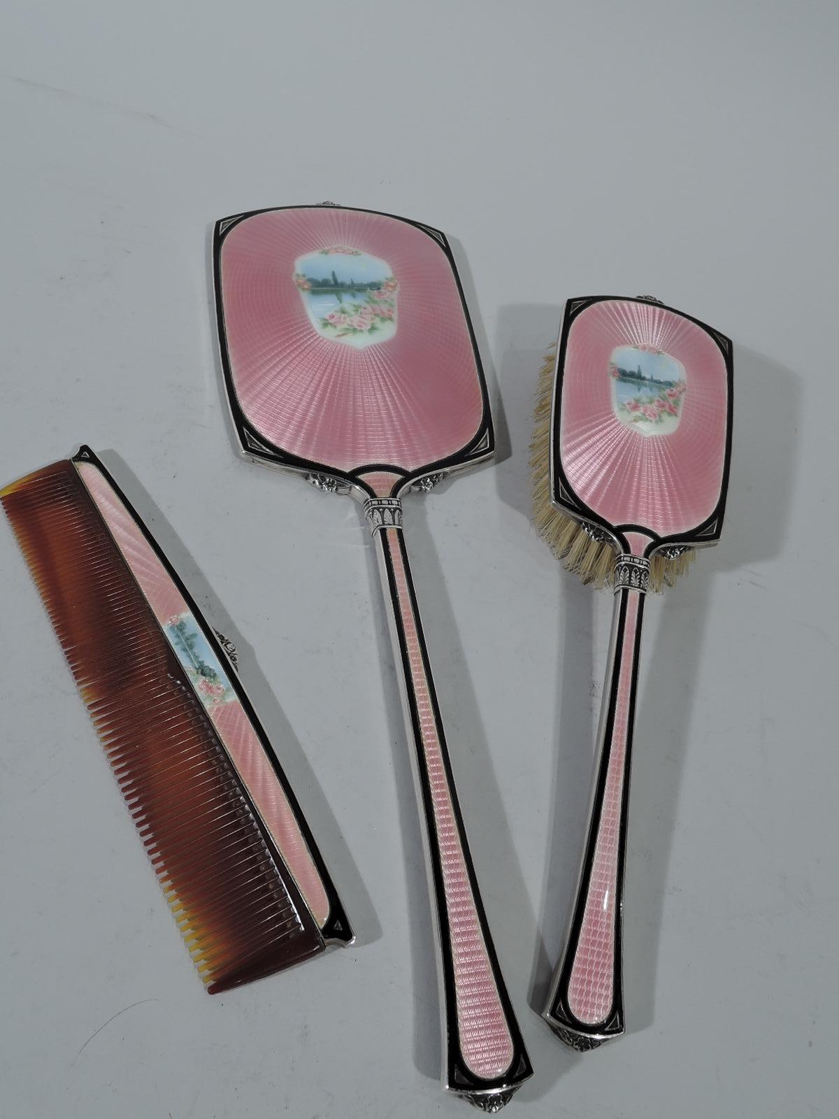 Art Nouveau sterling silver and enamel vanity set. Made by Foster & Bailey in Providence, ca 1900. This set comprises hand mirror, hairbrush, and comb. Mirror and brush have curved rectilinear frame with upward tapering handle. Each: Nocturnal