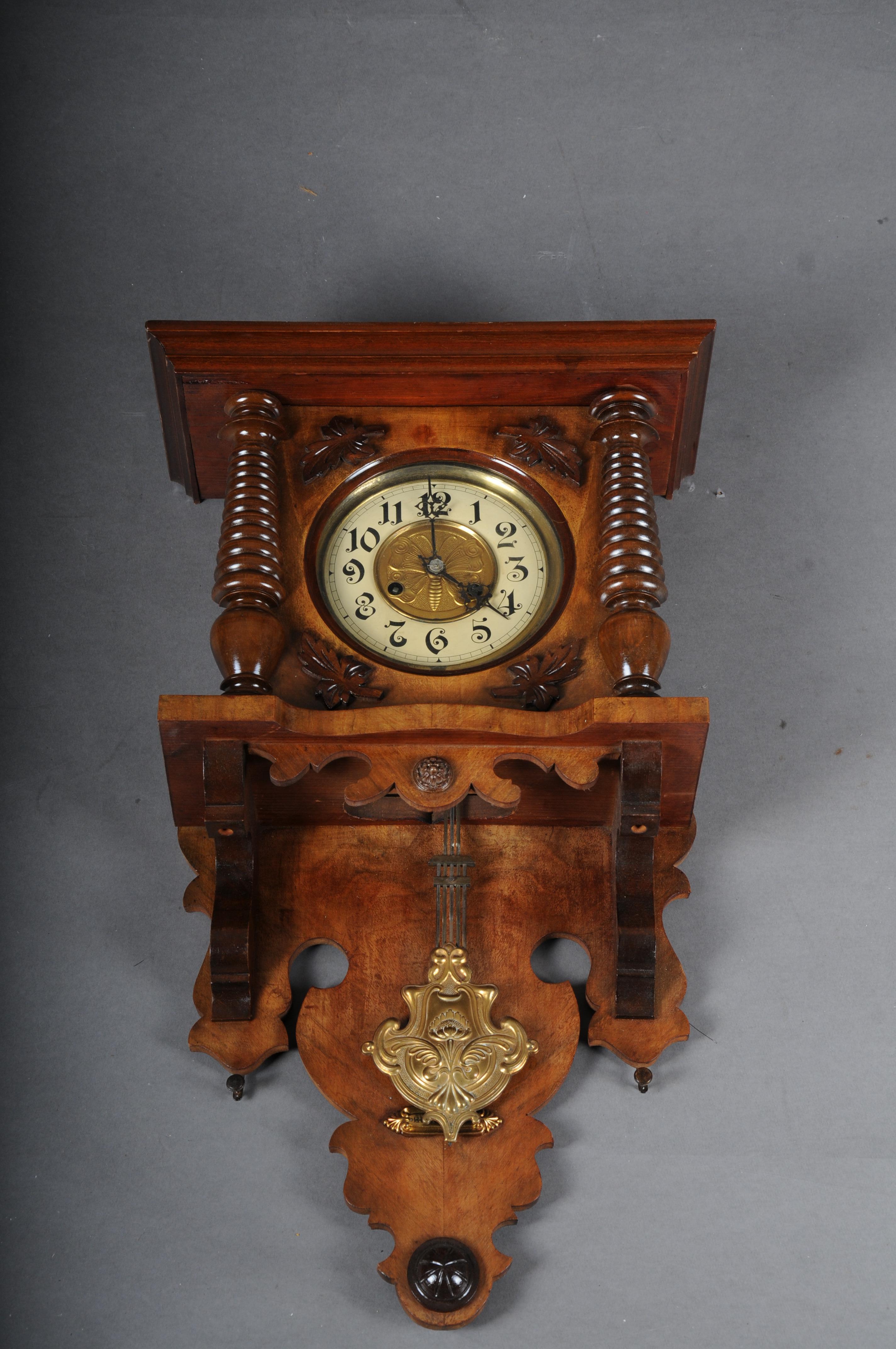Antique found time wall clock/regulator from around 1880

Solid wood, richly carved with brass pendulum.
Movement needs to be checked.