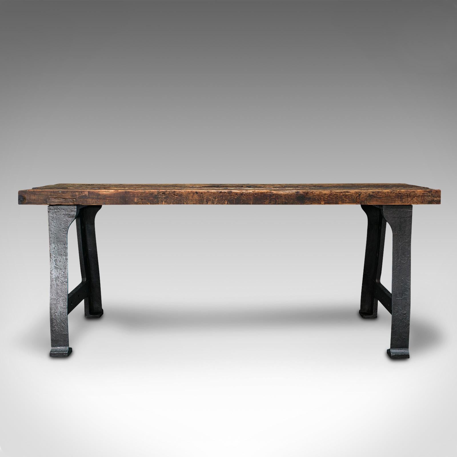 This is an antique foundry table. An English, pine and cast iron heavy centrepiece table of superb industrial taste, dating to the early Victorian period, circa 1850.

Wearing time-served appeal with aplomb and wonderfully robust
Displays a