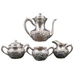 Vintage Four-Piece Sterling Silver Floral Repousse Tea Set, circa 1900