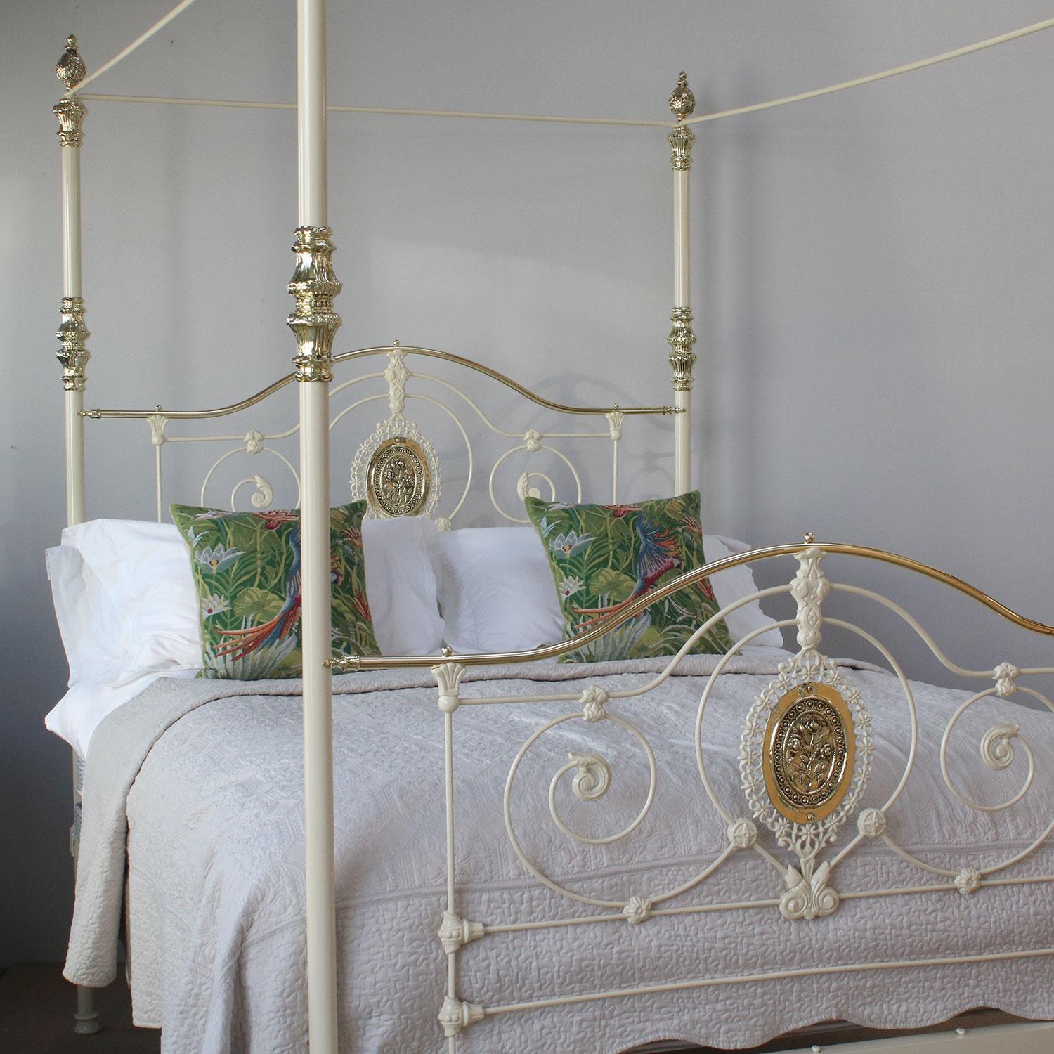 A mid-Victorian four-poster bedstead with attractive central brass plaque and serpentine top rail finished in cream

This bed accepts a British king size or American queen size (5ft wide, 60 inches or 150cm) base and mattress set.

The price is