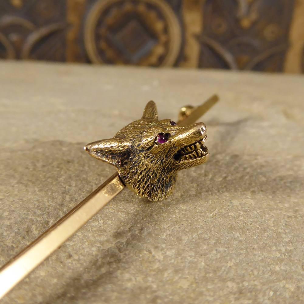 This lovely Fox Head Brooch has been crafted in 15ct Yellow Gold with engraving showing the details on the face. Set with Cabochon Rubies for the eyes this piece really comes alive with this extra colour. Hand made in the Edwardian era this brooch