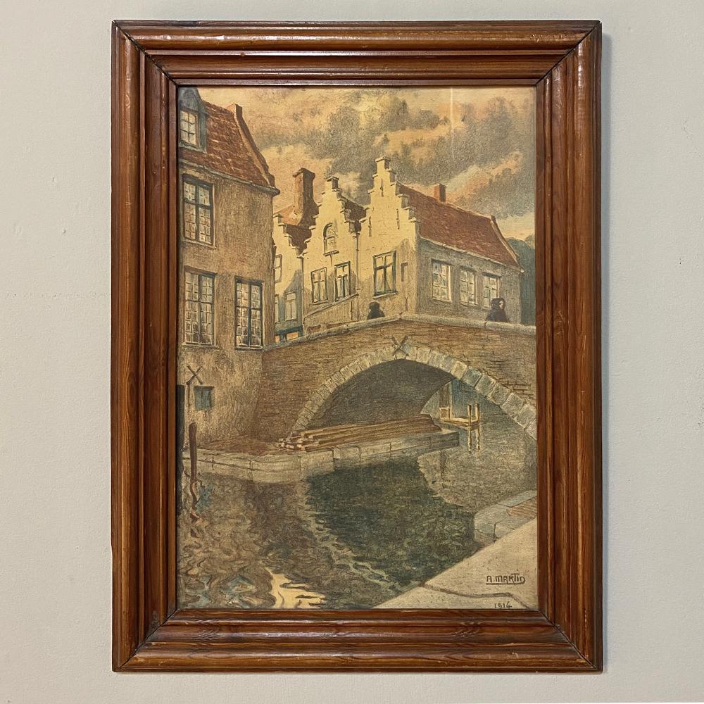 Antique framed charcoal & watercolor of a baroque village by Alfred Martin, Dated 1914 is a splendid work that features a Flemish village during the Baroque period. Such villages used canals to move merchandise and people around the environs, with
