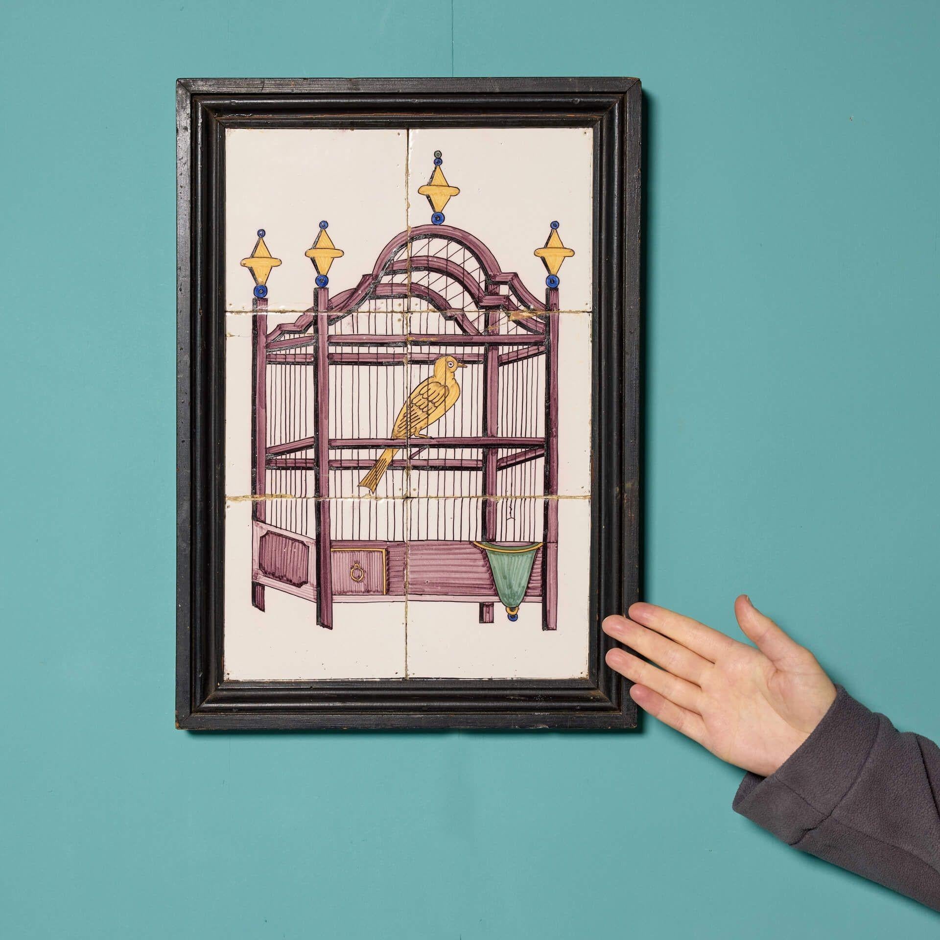 This antique framed tile panel depicting a bird in a decorative cage, sourced from the estate of Dame Barbara Mary Quant, is quite the find. Displayed in a frame, the tiles make a beautiful artwork piece, looking wonderful hung on the wall of period