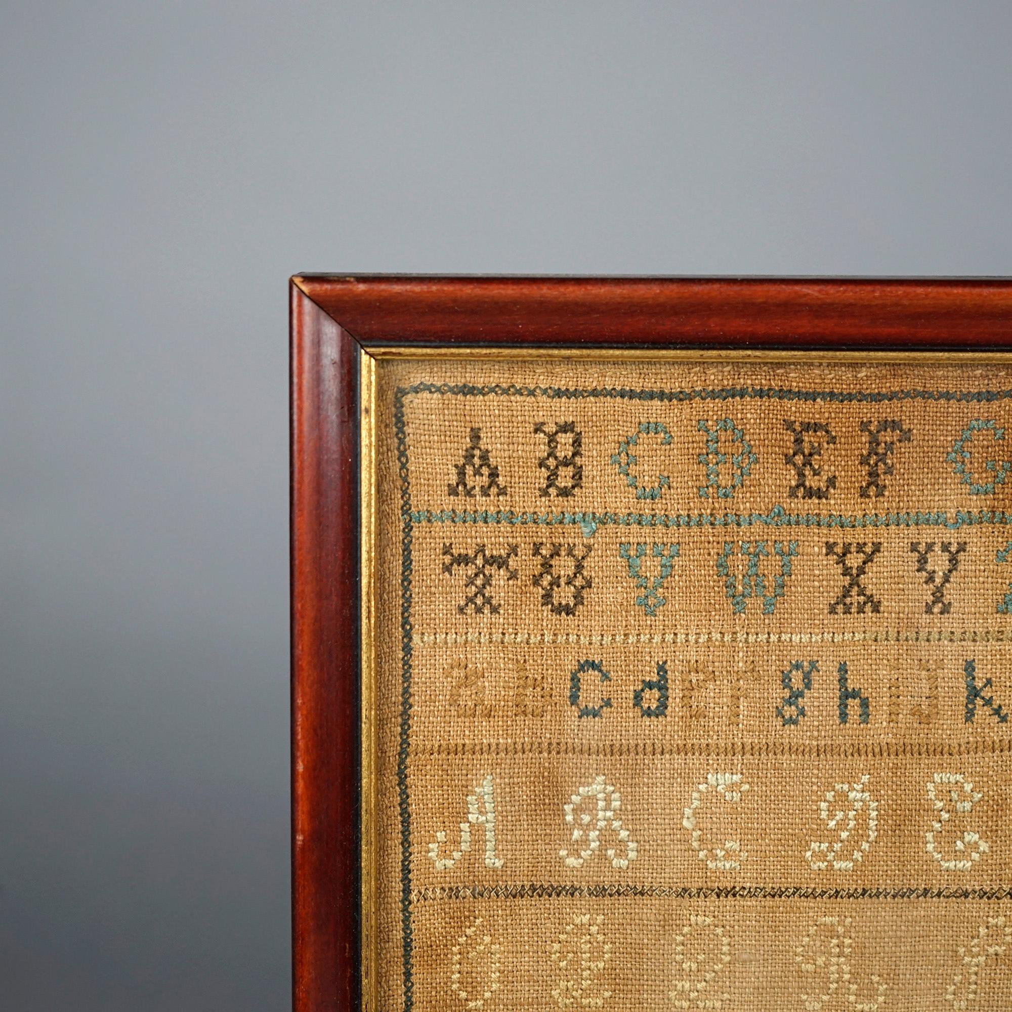 An antique ABC alphabet sampler offers hand crafted needlework alphabet on linen, lower right right dated 1830, mounted and framed.

Measures- 12'' H x 12'' W x .5'' D.

Catalogue Note: Ask about DISCOUNTED DELIVERY RATES available to most regions