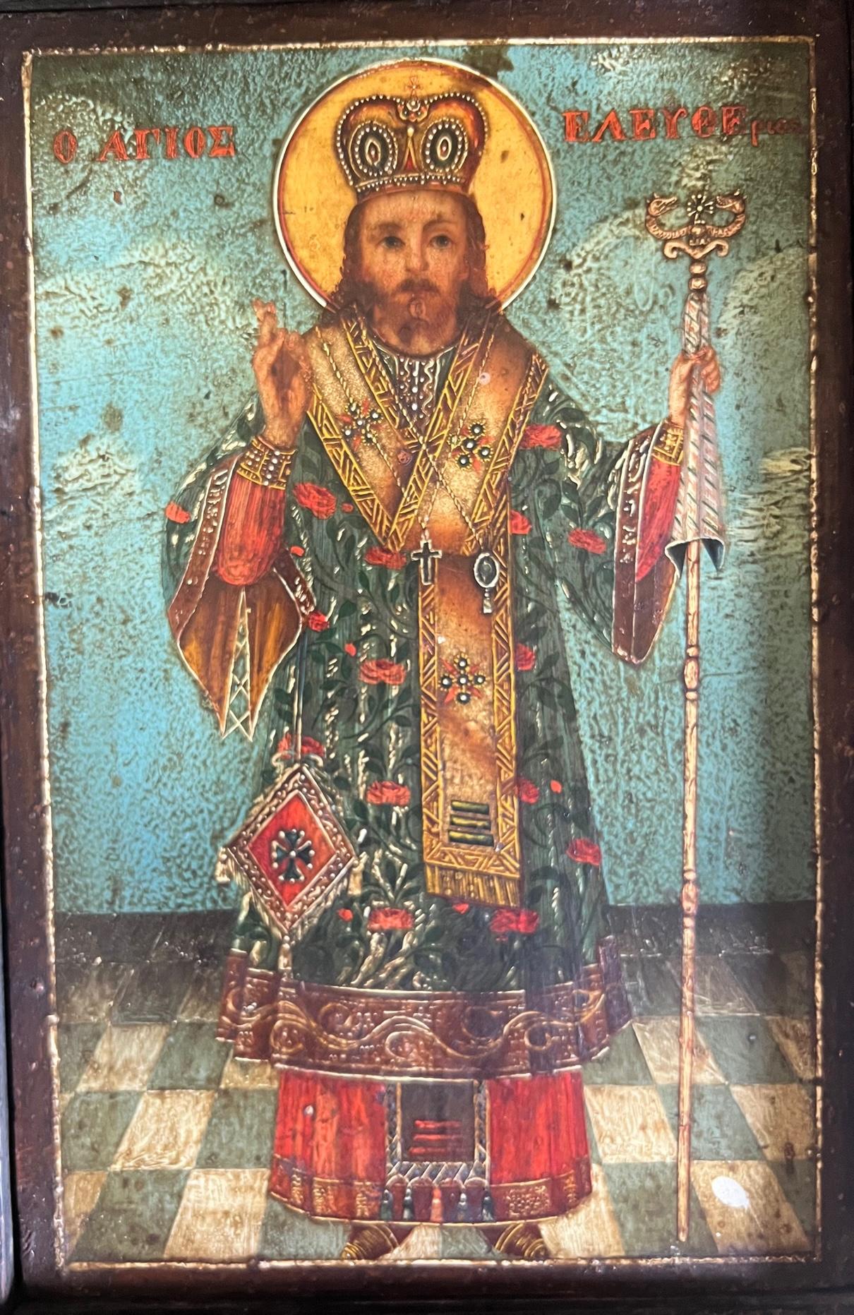 Very detailed vibrantly painted icon on wood with gilt accents and raised braille like details throughout. The 19th century or earlier painting is set in a hand made wooden frame.
