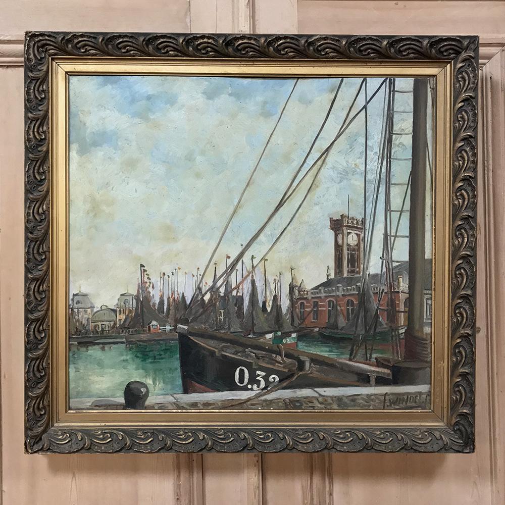 Antique Framed Oil Painting on Board by F. Windel depicts an intriguing perspective of an impressionistic harbor scene at dawn with the fishing fleet readying to depart. Note the clock tower situated such that the fleet can tell the exact time of