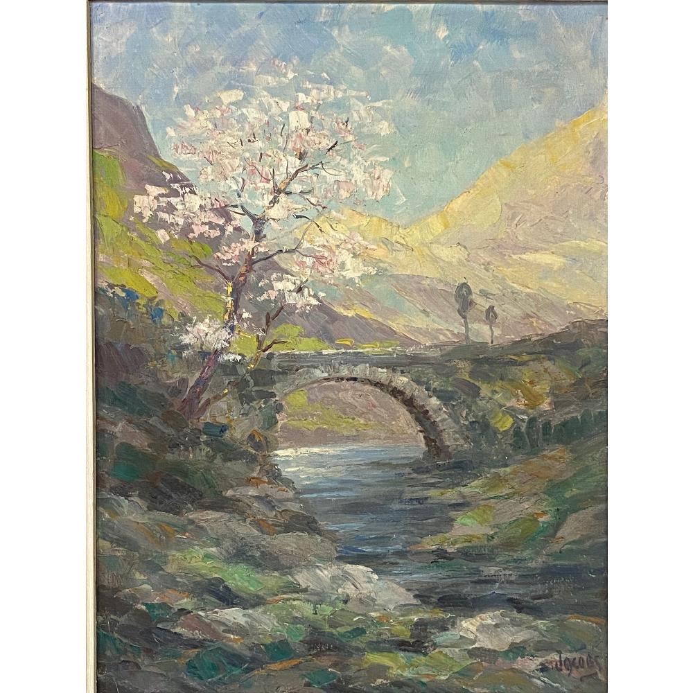 Antique framed oil painting on canvas by Dieudonne Jacobs (1887-1967) is a delightful work in pastel hues depicting a lovely springtime scene of a stone bridge over a babbling brook. Dieudonne Jacobs (1887-1967) was born in Liège and spent his life