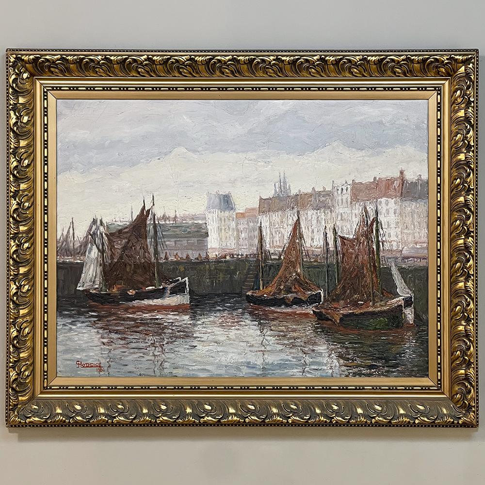 Antique framed oil painting on canvas by G. Hodeige dated 1936 is an exquisitely well preserved impressionist work by a master of light and shadowplay rendered of a waterside cityscape that harks back to a bygone era. The city in the background is