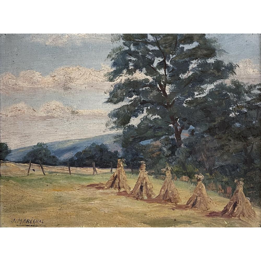 Antique framed oil painting on canvas by J. Marechal is a splendid post-impressionist harvest scene with rolling hills in the background and a large tree dominating the composition. In the foreground appear several bundles of freshly harvested hay.