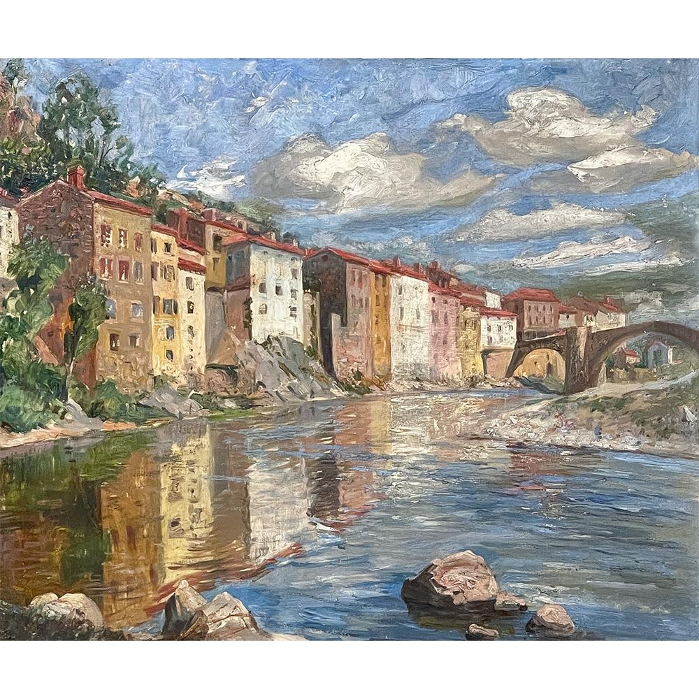 Antique framed oil painting on canvas by Jean Chaleye (1878-1960) combines the attributes of a charming European cityscape with those of the traditional landscape pastoral, creating an inviting scene that positions the viewer right on the bank of a