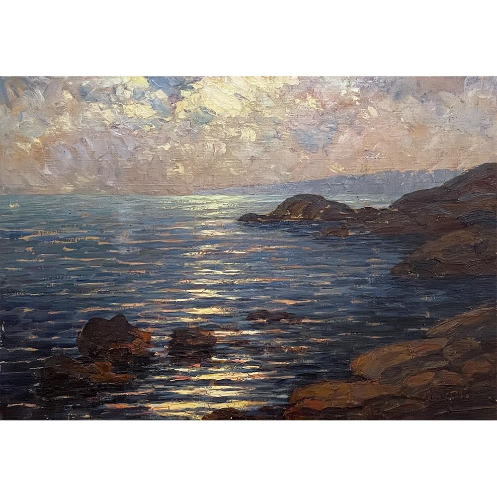 Antique framed oil painting on panel by Dieudonne Jacobs (1887-1967) is a splendid work inspired by the sun setting over the Mediterranean coast. Jacobs has masterfully rendered the scene with the rocky coast interacting with the ripples of the