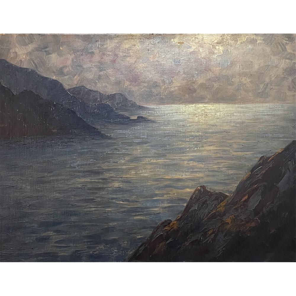 Antique Framed Oil Painting on Panel by Dieudonne Jacobs (1887-1967) is a splendid work inspired by the sun setting over the Mediterranean coast. Jacobs has masterfully rendered the scene with the rocky coast interacting with the ripples of the