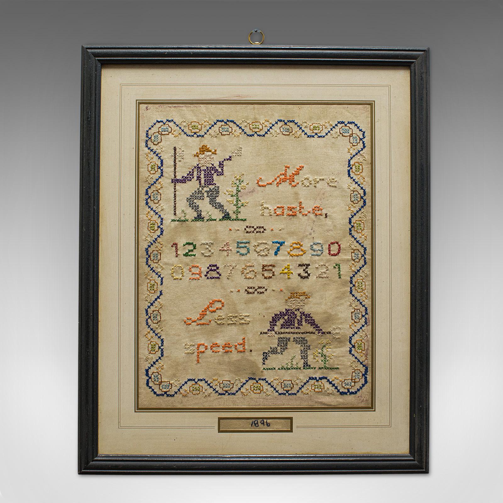 This is an antique framed sampler. An English, cross-stitch apprentice piece from the late Victorian period, dated to 1896.

Sought after Victorian sampler
Displays a desirable aged patina
Hessian cloth with colorful cross-stiched thread
Small