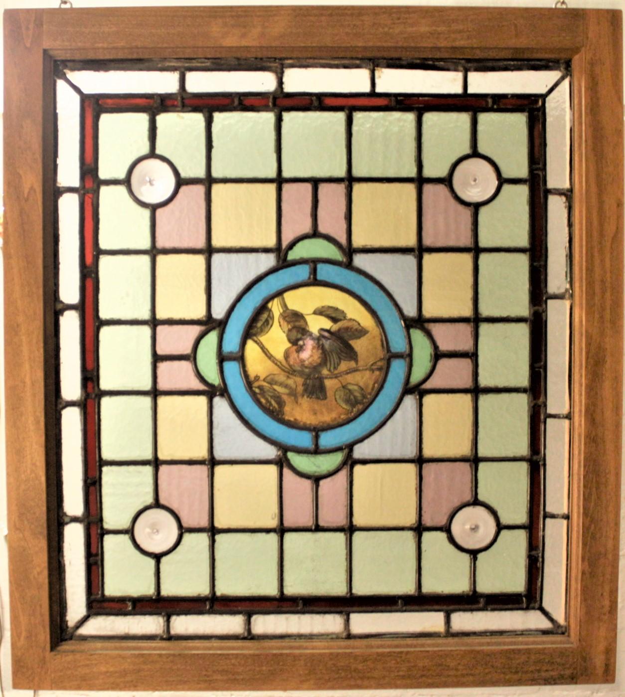 Antique Framed Victorian Stained Glass Window with a Hand Painted Bird Medallion 1