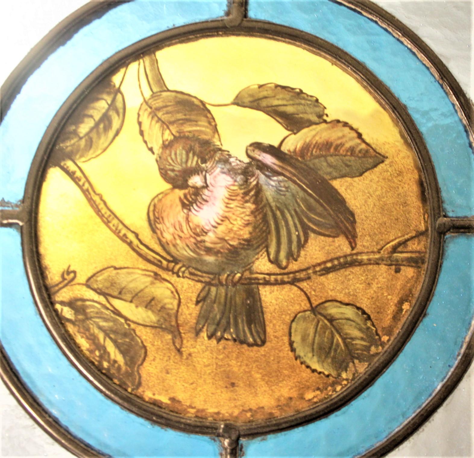 American Antique Framed Victorian Stained Glass Window with a Hand Painted Bird Medallion