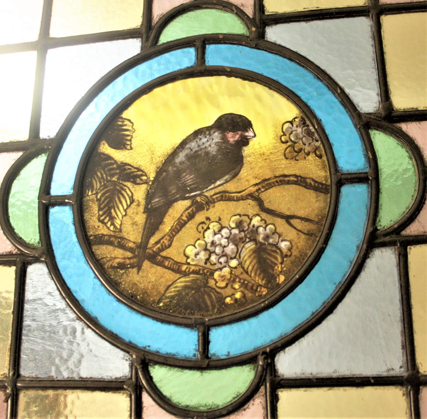 19th Century Antique Framed Victorian Stained Glass Window with a Hand Painted Bird Medallion