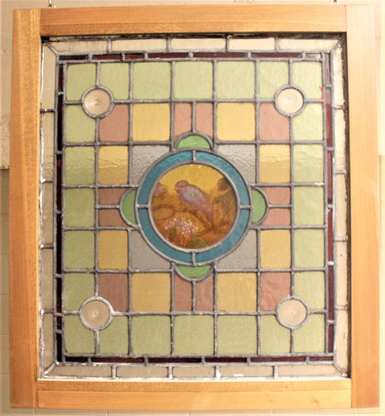 Cut Glass Antique Framed Victorian Stained Glass Window with a Hand Painted Bird Medallion