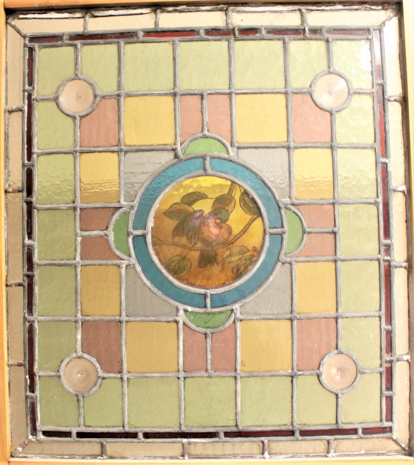 Antique Framed Victorian Stained Glass Window with a Hand Painted Bird Medallion In Good Condition In Hamilton, Ontario