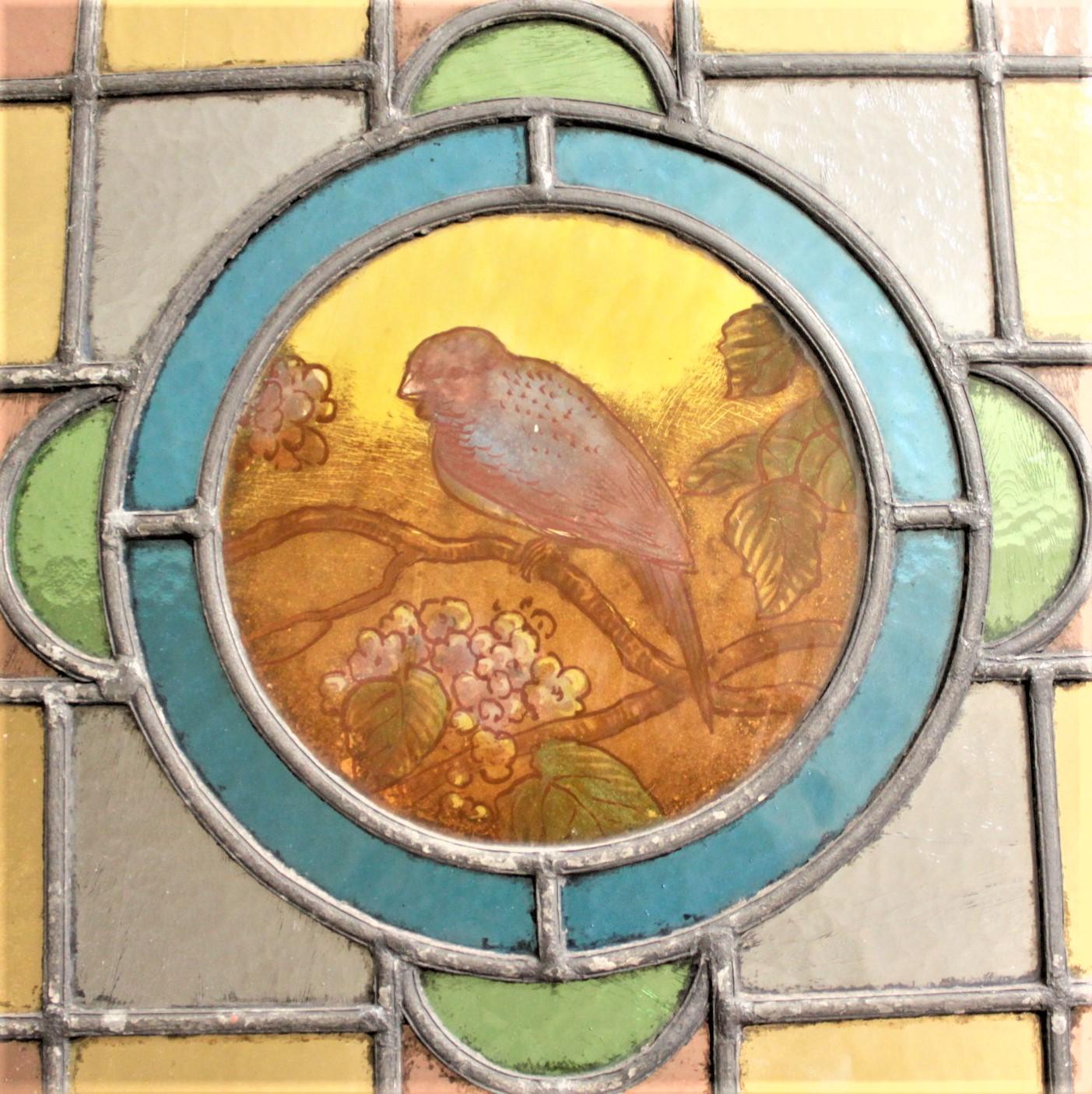 Antique Framed Victorian Stained Glass Window with a Hand Painted Bird Medallion 1