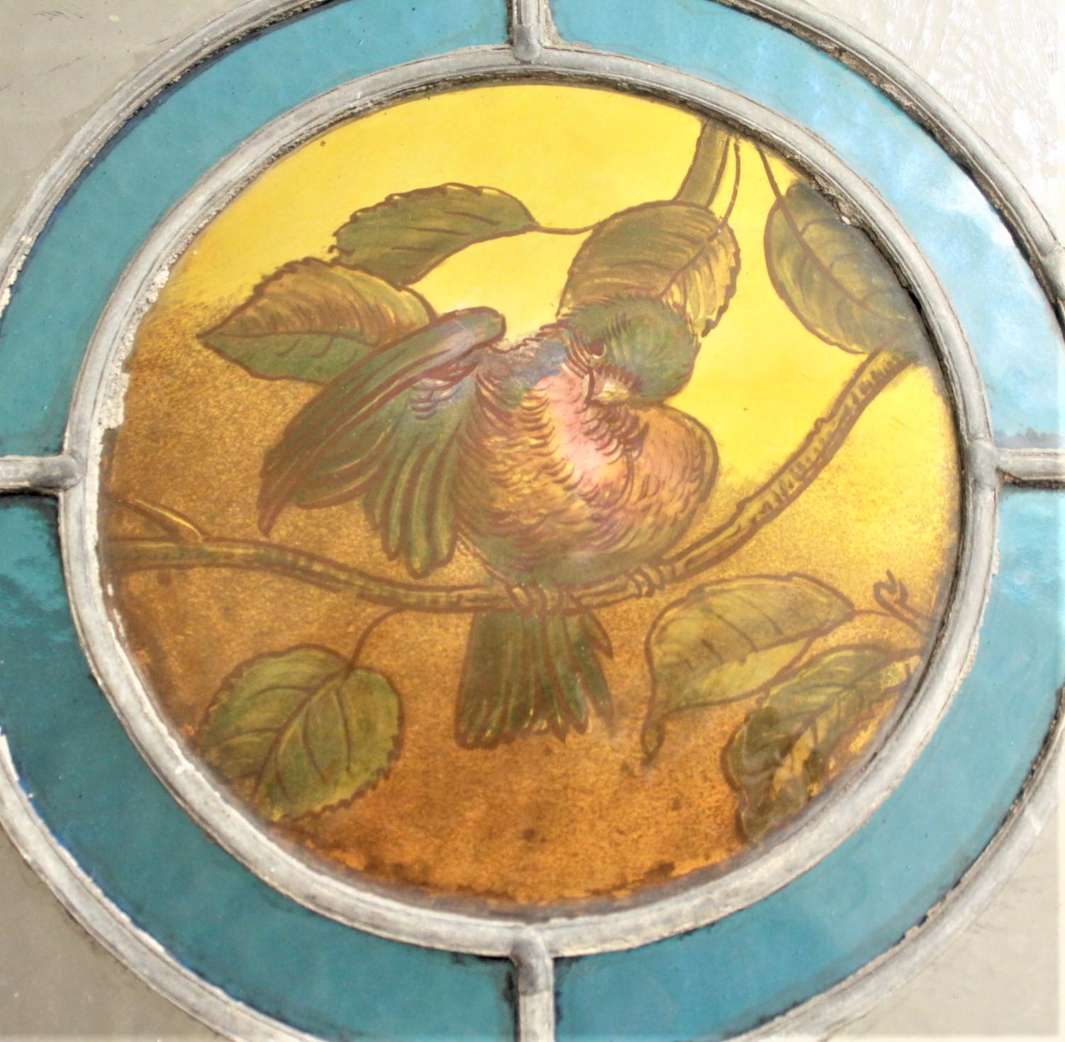 19th Century Antique Framed Victorian Stained Glass Window with a Hand Painted Bird Medallion