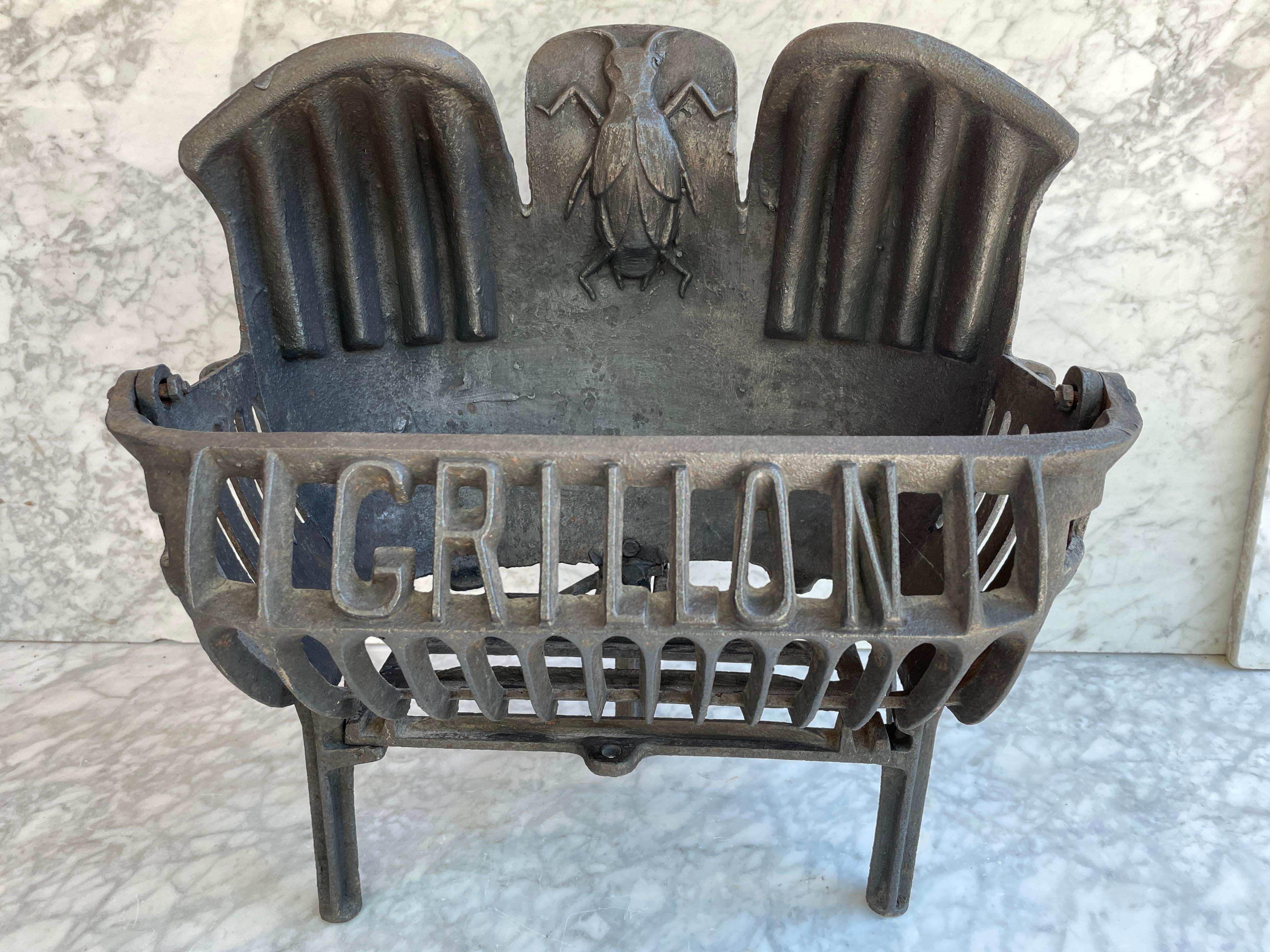 Antique cast iron fireplace grate or basket 