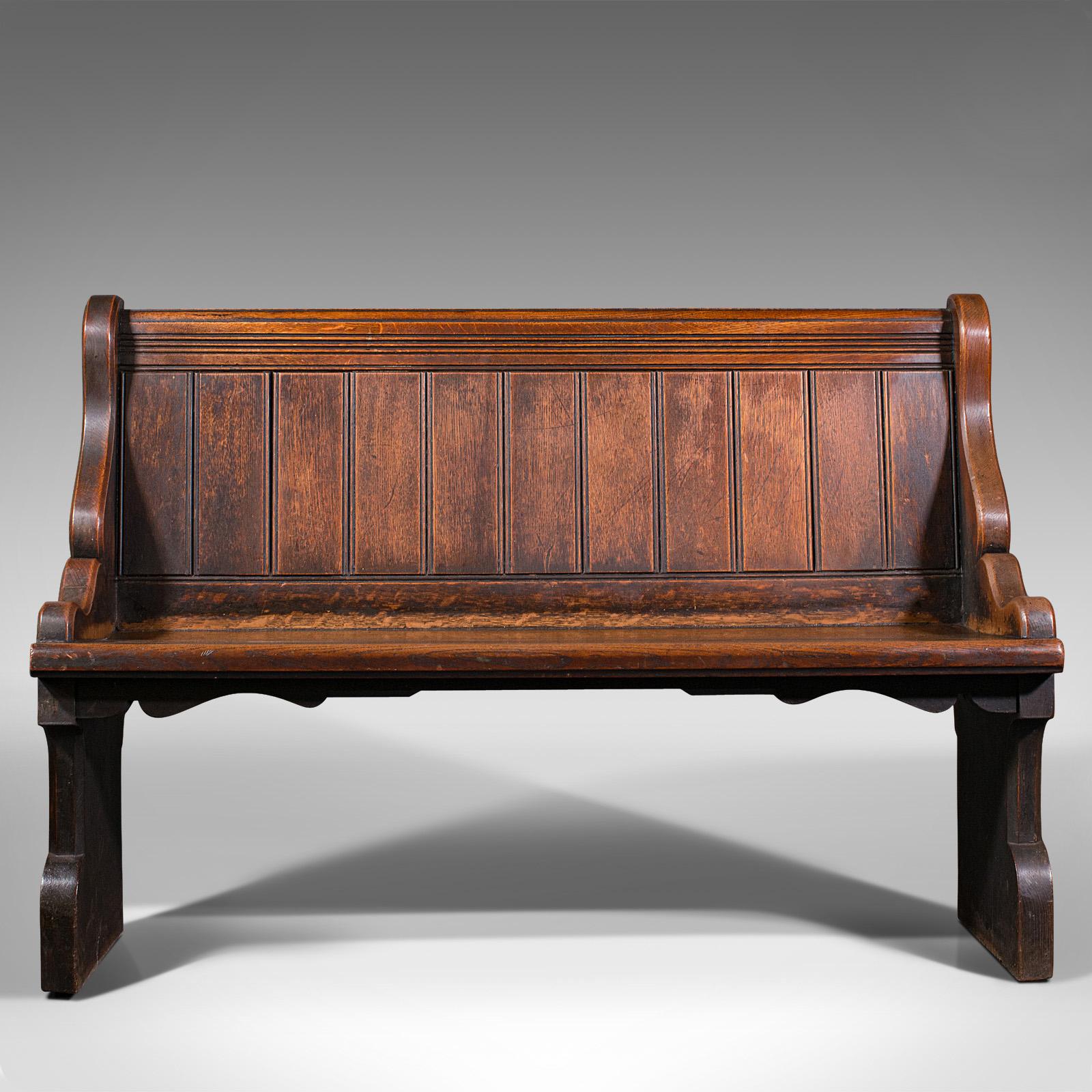 This is an antique free-standing pew. A Scottish, oak bench seat with ecclesiastical taste, dating to the early Victorian period, circa 1850.

Fine example of Scottish Victorian craftsmanship
Displays a desirable aged patina throughout
Select
