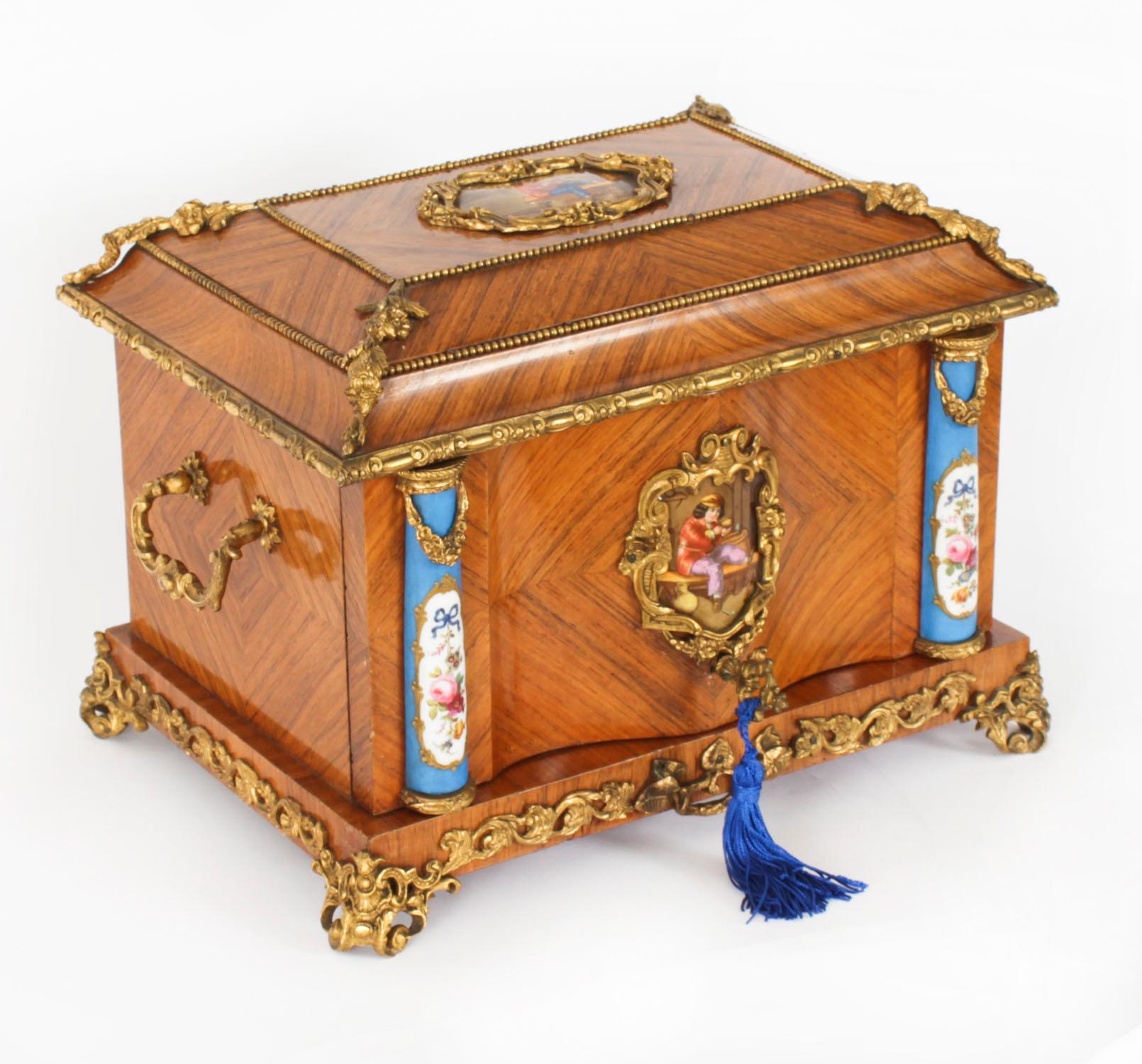 This is a magnificent antique French wood, ormolu and Sevres porcelain mounted, cigar humidor, circa 1870 in date.

The serpentine fronted casket is of rectangular form and feaures a hinged moulded lid and front with applied foliate and beaded