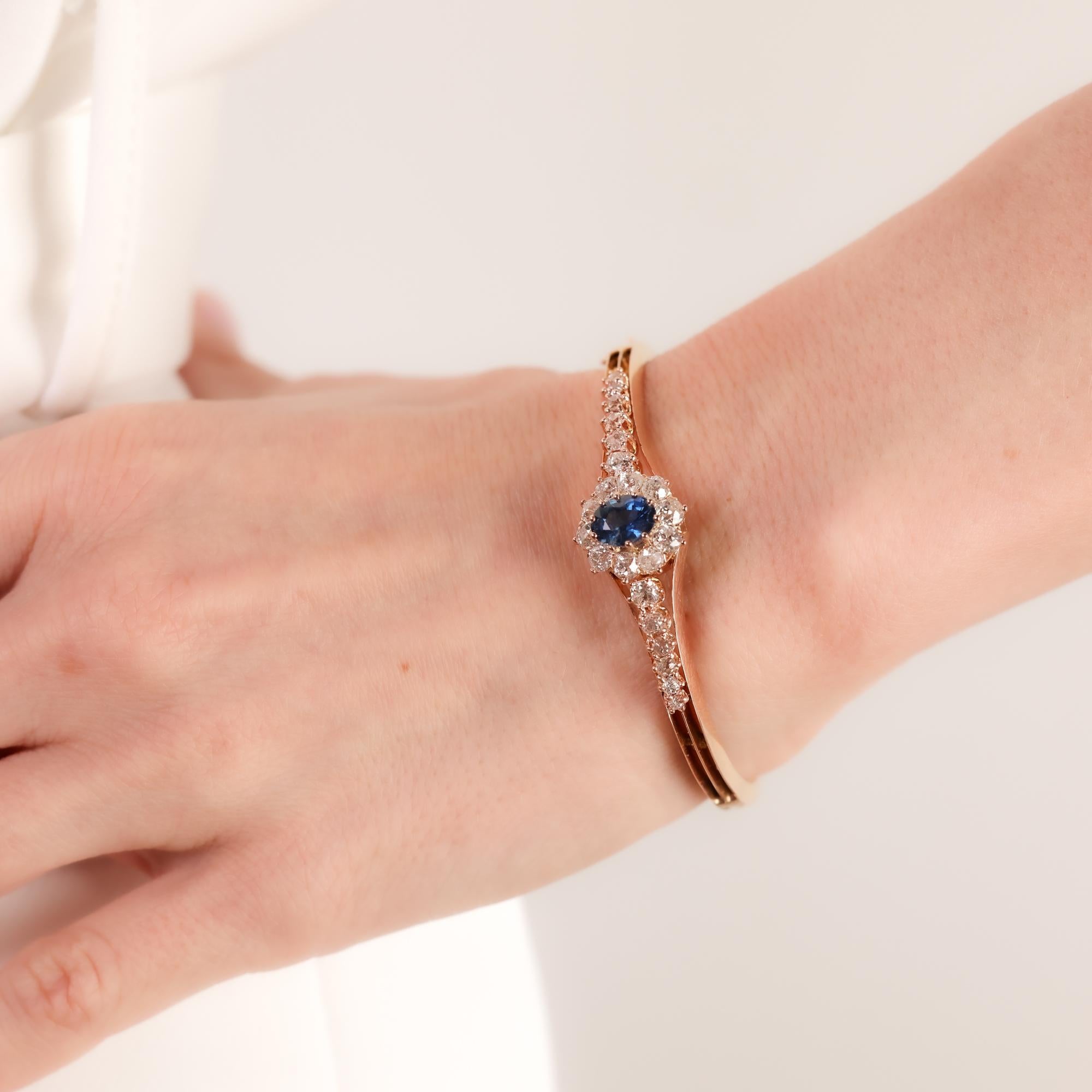 A stunning antique French bracelet showcasing a 1.60-carat oval cut sapphire, encircled by old mine cut diamonds in rich 18k rose gold for a timeless statement.

Center stone: Oval cut blue sapphire 
Weight: Approximately 1.60 carat
Accent stone: 22
