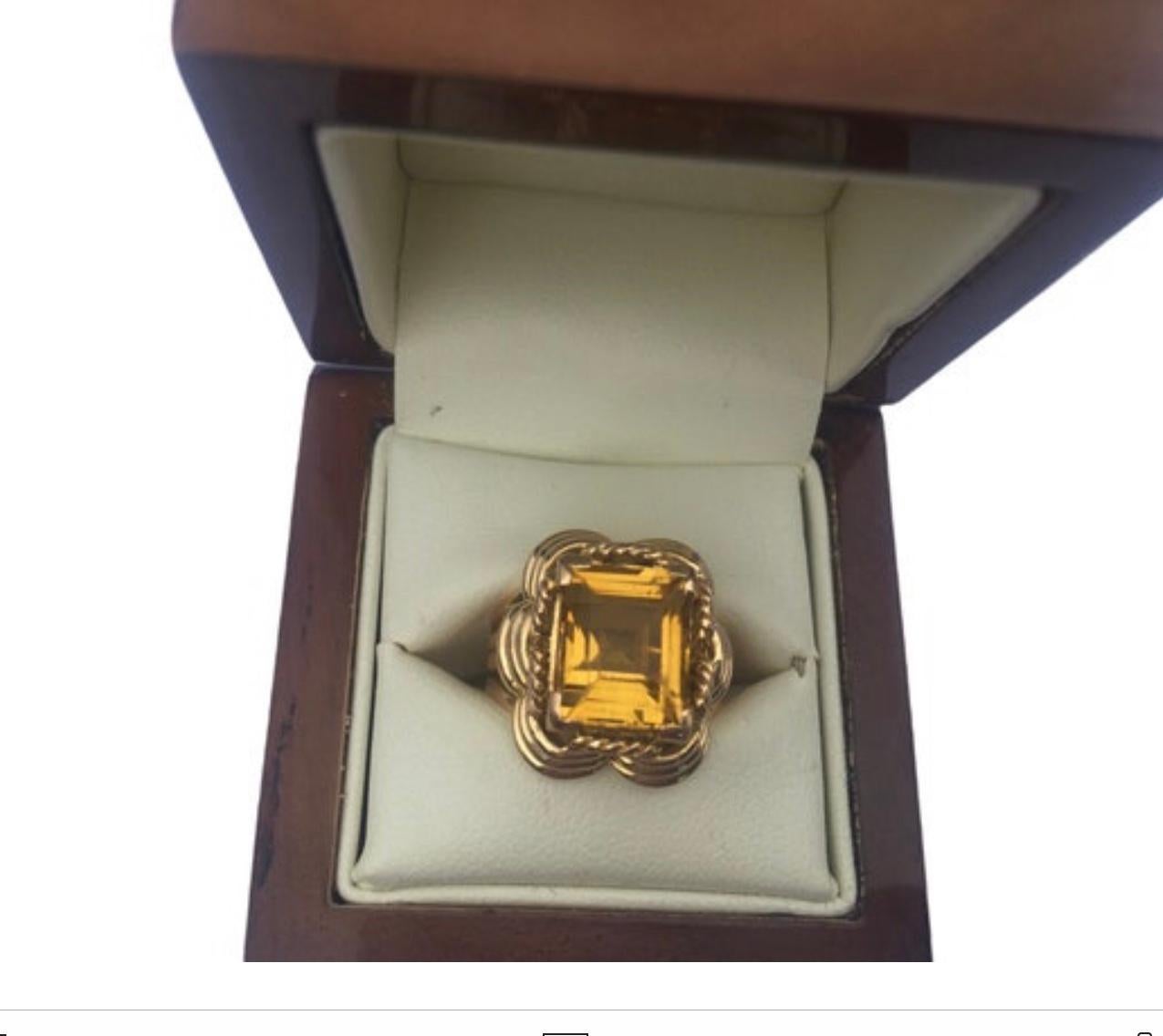 Antique french 18 carat gold ring set with an archer cut citrine.
French hallmark eagles head for 18 carat gold
Era 1950’s 
In very good condition 
Wear consistent with age and use 
Ring size EU 50 US 5 3/4 UK L 
Weight 9.9 g
Size of the ring head