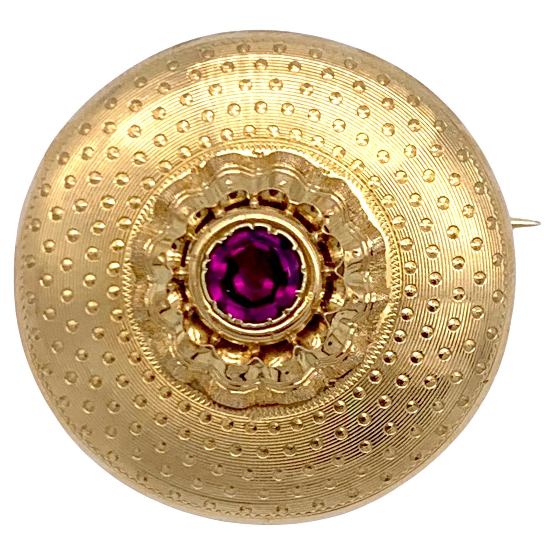 Broche cible française ancienne en or 18 carats avec grenat almandine en vente