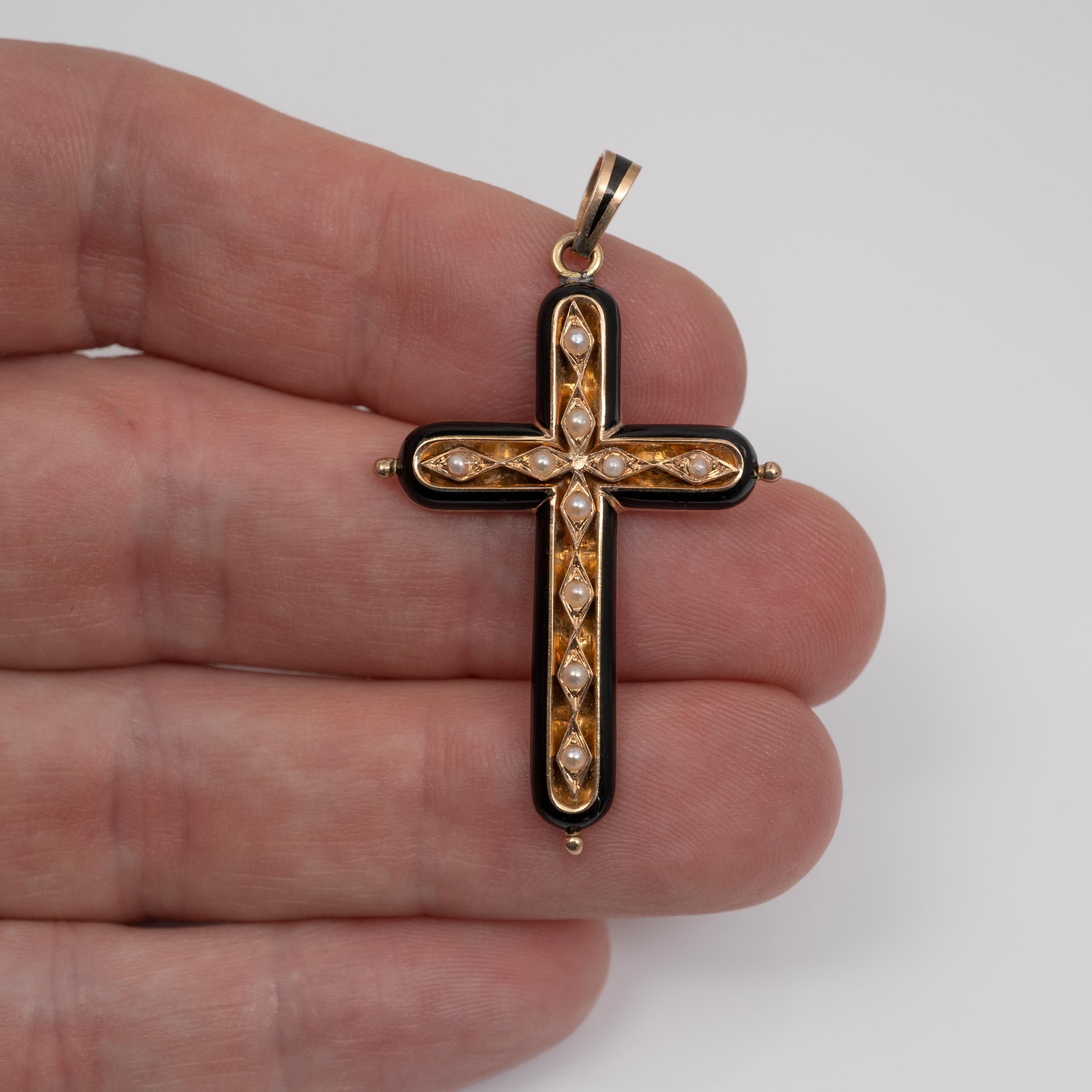 A quality antique mourning cross pendant made in 18 karat rose gold, enamel and pearl detail. Circa 1900 France

The quality piece has faint marks to the ring bale and we have tested to confirm 18 karat gold quality.

A nicely made piece coming from