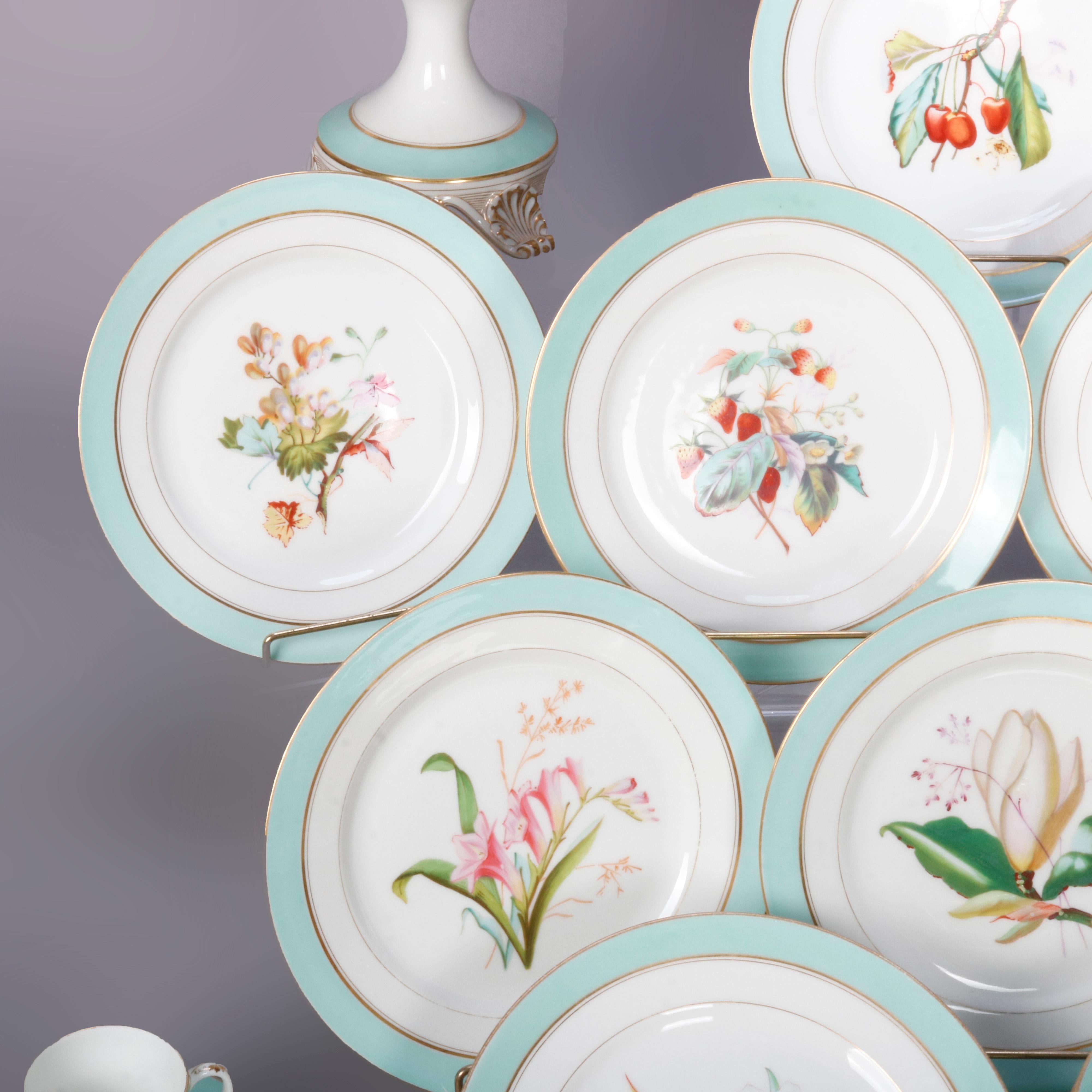 An antique French Old Paris Jacob Petit School Limoges porcelain China dessert set offers hand painted floral plates and compotes with aqua marine blue rims, gilt highlights throughout, set includes 16 plates, 2 compotes and 8 sets with cup and