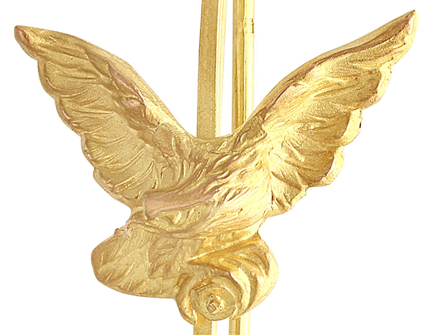 A fine and impressive 18 karat yellow gold pin brooch in the form of an eagle; part of our diverse antique estate jewelry collections.

This fine and impressive antique pin brooch has been crafted in 18k yellow gold, realistically modelled in the