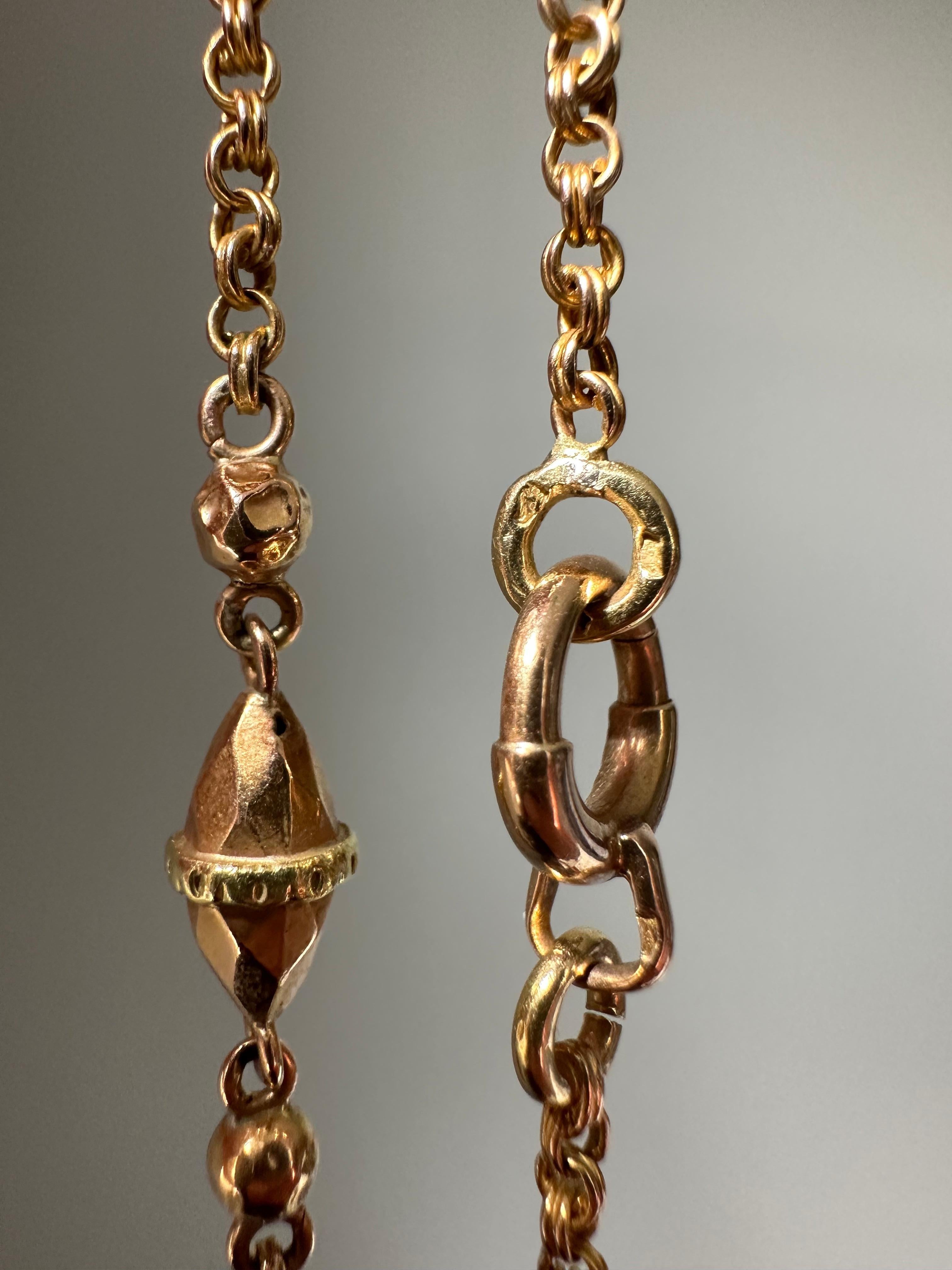 This glorious antique French chain is composed of pairs of delicate interlocking 18K rose gold rings spaced by four faceted bicolor torpedo stations. This will very quickly become a staple in your jewelry wardrobe!

Weight: 13.2 grams

Length: