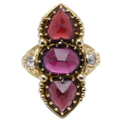 Bague navette française ancienne en or 18 carats, grenat et diamants