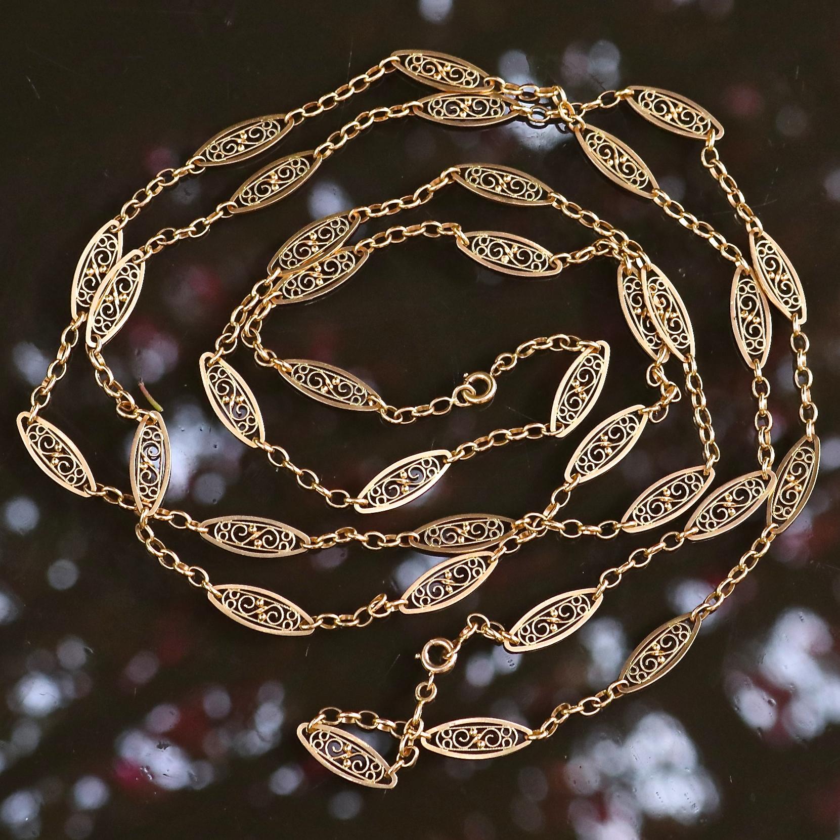 Found on an extensive trip through Southern France, this Antique French 18k gold necklace is a one of a kind find. At 55 inches long, it can be worn long or wrapped several times for a luxurious layered look. Featuring elegant elongated oval