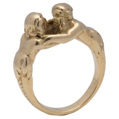 Antique French 18K Gold Ring Depicting a Man and Woman Embracing