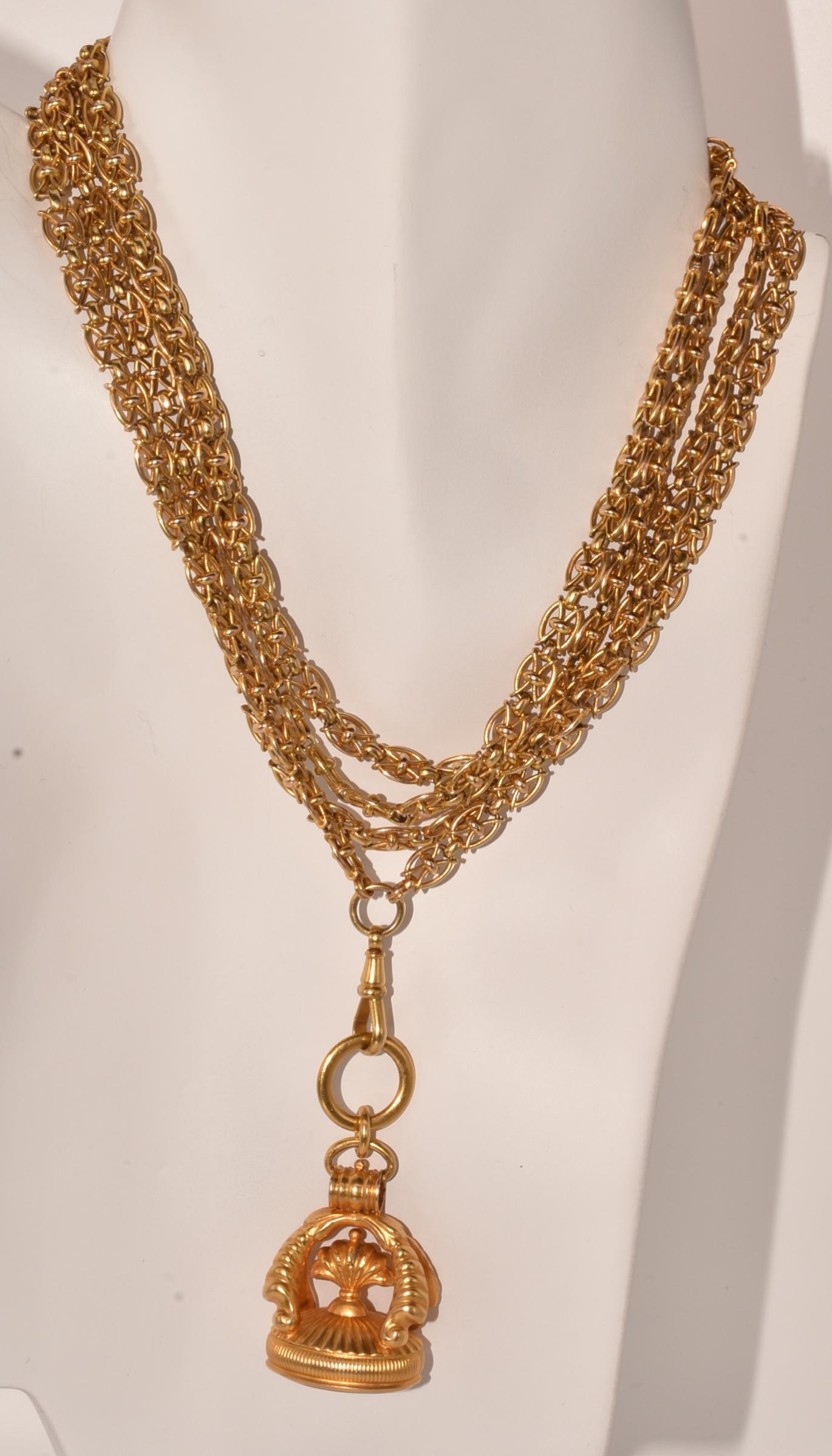This fancy link English chain is solid, sturdy and beautiful, original watch chain. in its original length. The chain dates to C1900 and  measures 61 inches including the hook. It has an 18K ring from which an 18K dog tag is attached, ready for your
