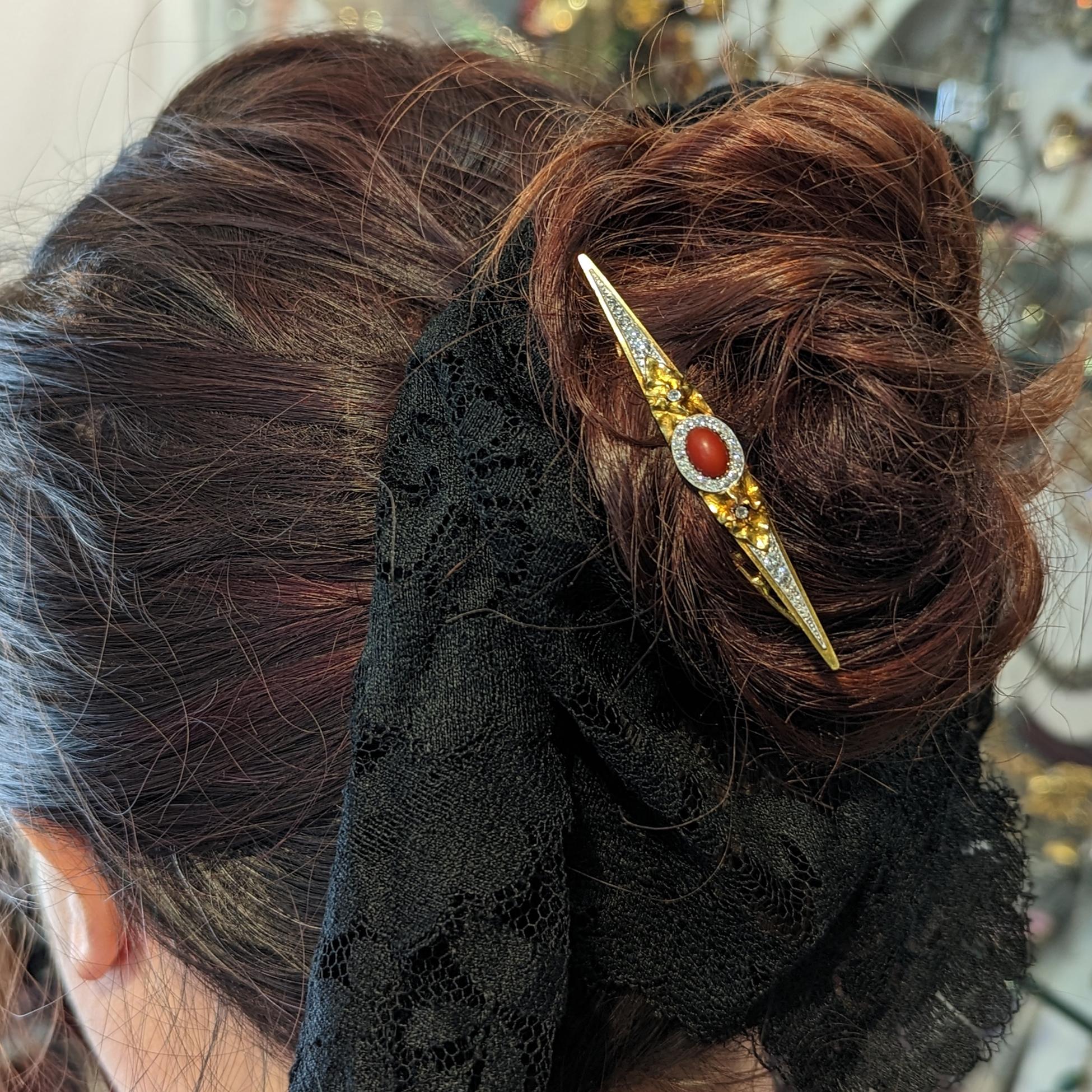 Antique French diamond coral hair barrette in elongated marquise shape. Crafted in 18K yellow gold & platinum with 28 diamonds & an oval shape coral.

Back clip is in 14K yellow gold
in similar shape for a more secure hold.

Approximate