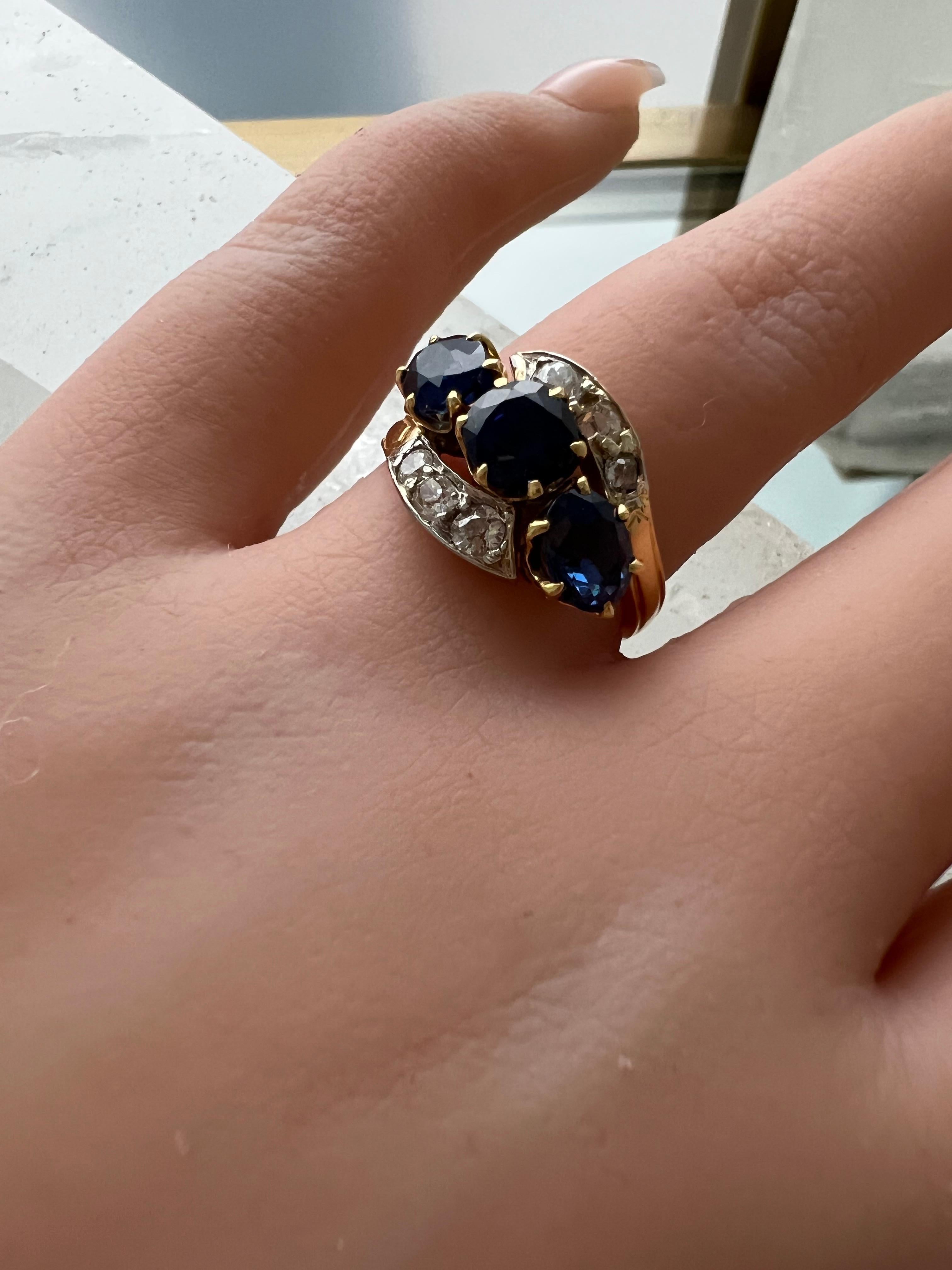 Antique Cushion Cut Antique French 18K Yellow Gold Diamond and Three Stone Sapphire ByPass Ring. For Sale