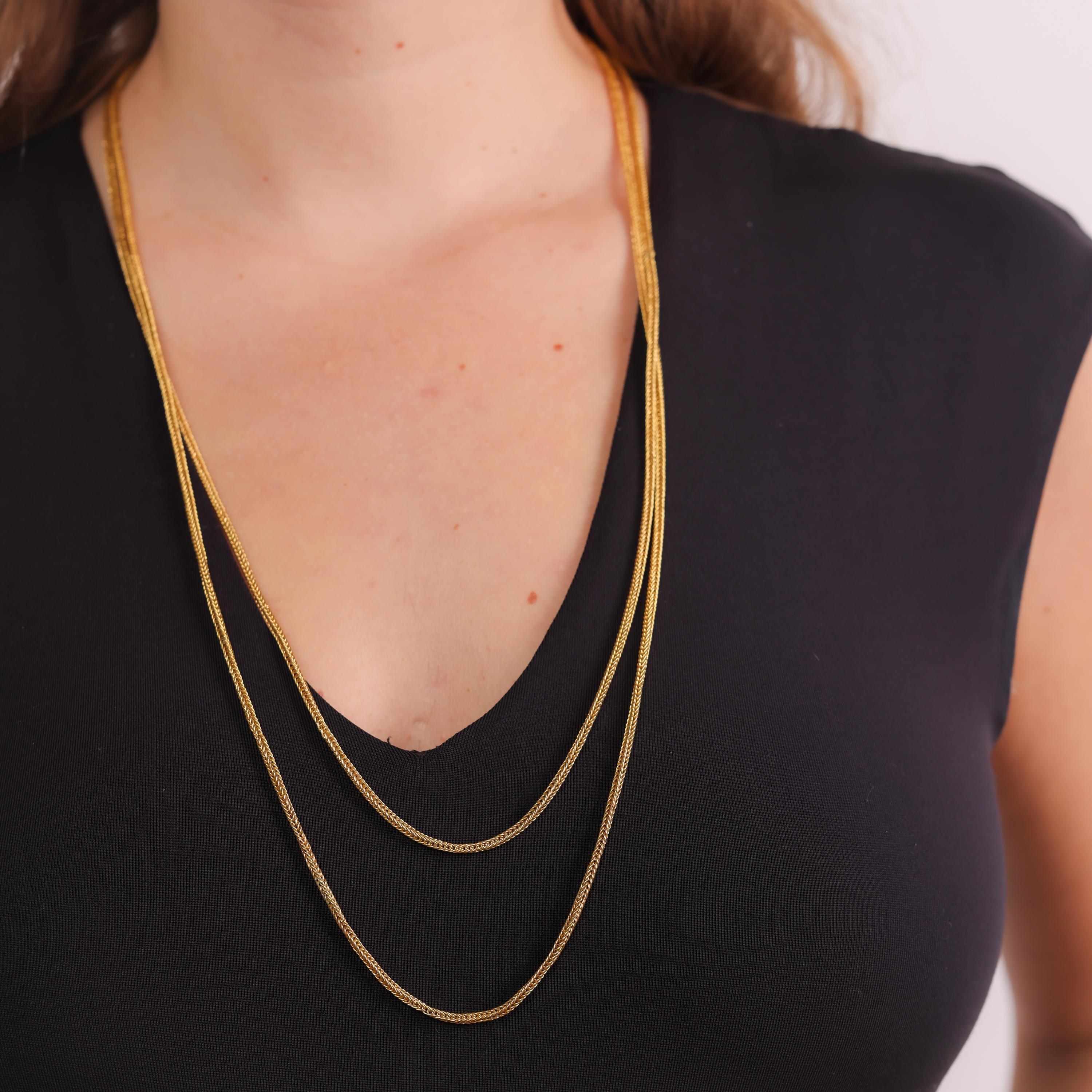 This antique 18k yellow gold chain necklace exudes timeless elegance with its refined craftsmanship and versatile design, a sophisticated piece from the 1890s.

Metal: 18K Yellow Gold 
Era: Antique
Circa: 1890's
Hallmarks: French Eagle Head and