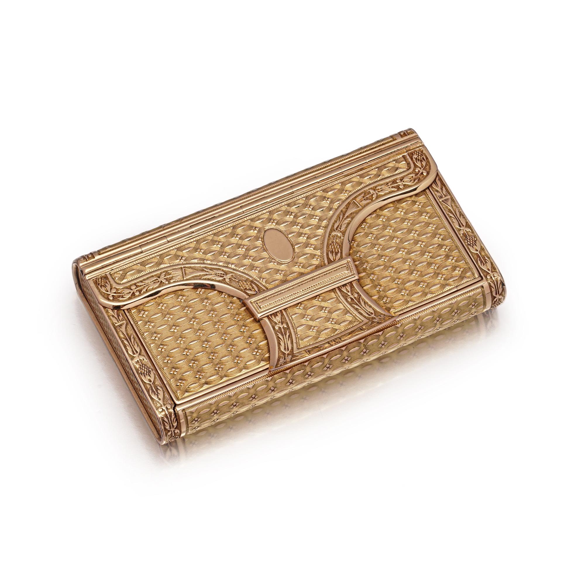 Antique French 18kt Gold Engine-Turned Snuff Box — Circa 1893–1919

A finely crafted French 18kt gold snuff box, featuring elegant engine-turned guilloché decoration framed by chased foliate borders and a central blank cartouche. This intricate